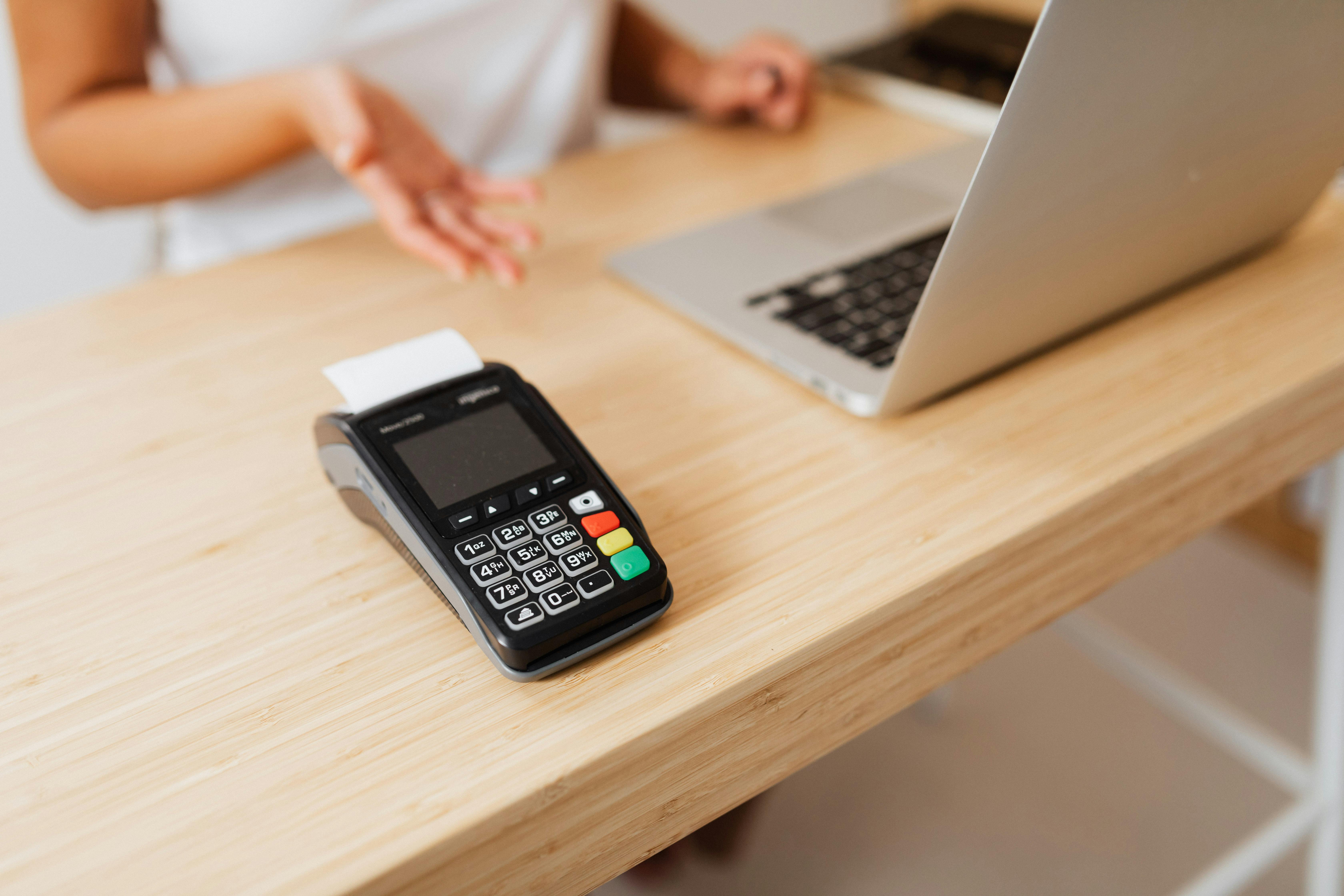 A card machine on a counter | Source: Pexels
