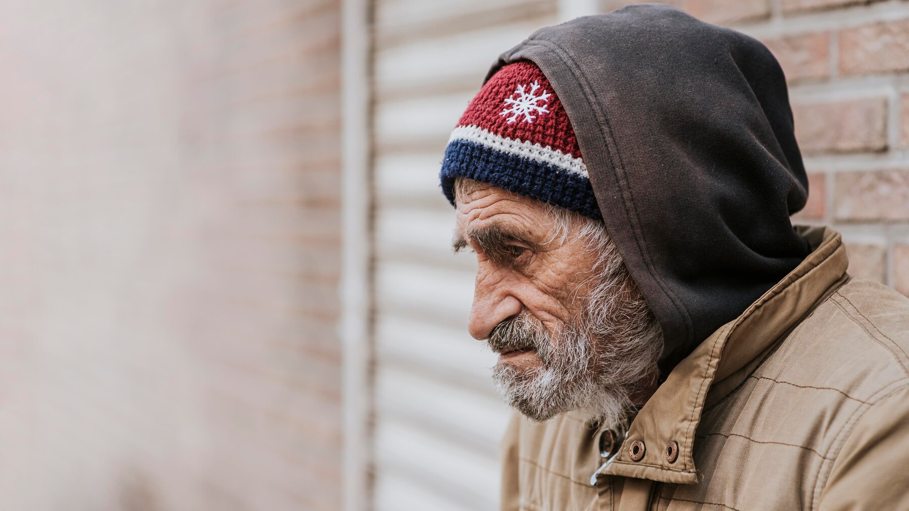 A sad homeless man | Source: Freepik