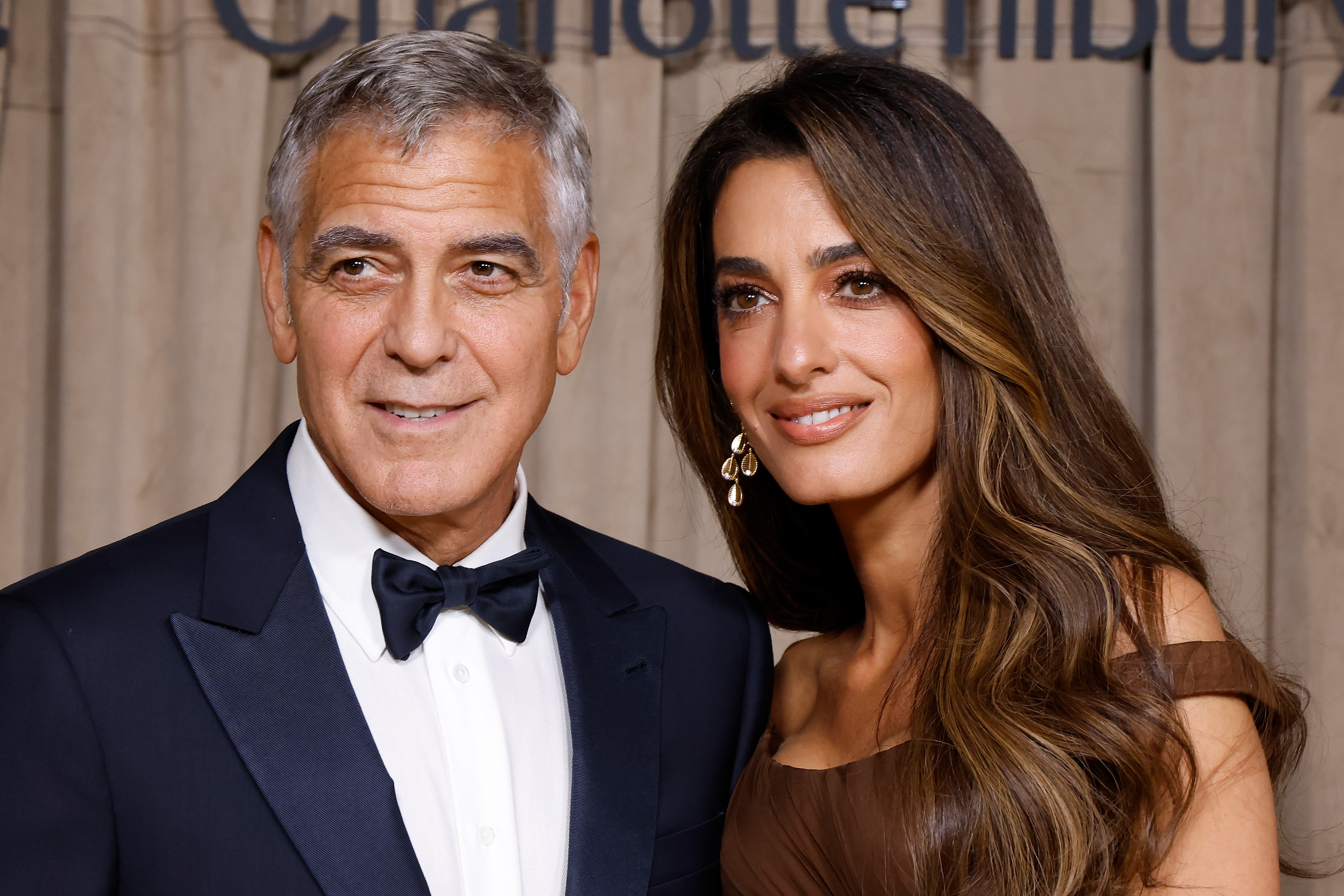 George and Amal Clooney attend the Clooney Foundation For Justice's The Albies at The Natural History Museum on October 03, 2025 in London, England. | Source: Getty Images