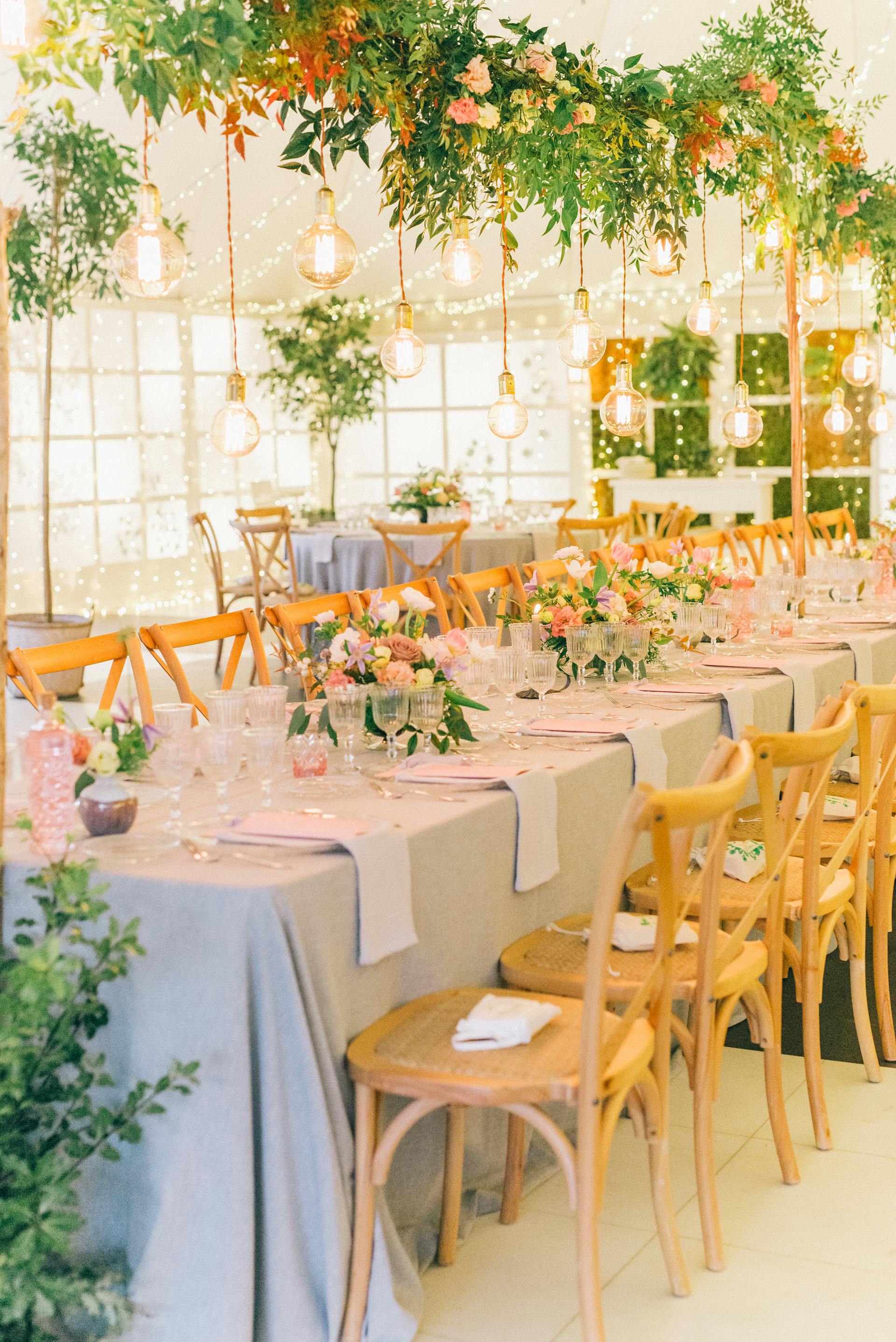 A party table with flower arrangements | Source: Pexels