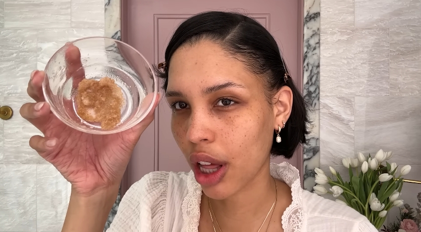 Nara Smith showing her homemade lip scrub from a video dated December 12, 2024. | Source: YouTube/Vogue