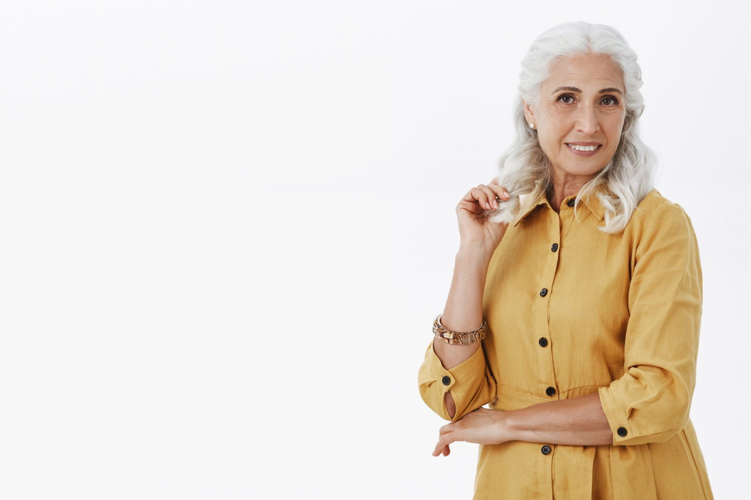 An expressive senior woman smiling | Source: Freepik