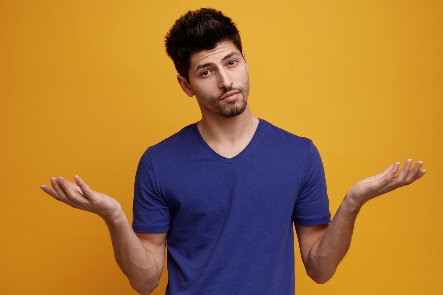 A man shrugging | Source: Freepik