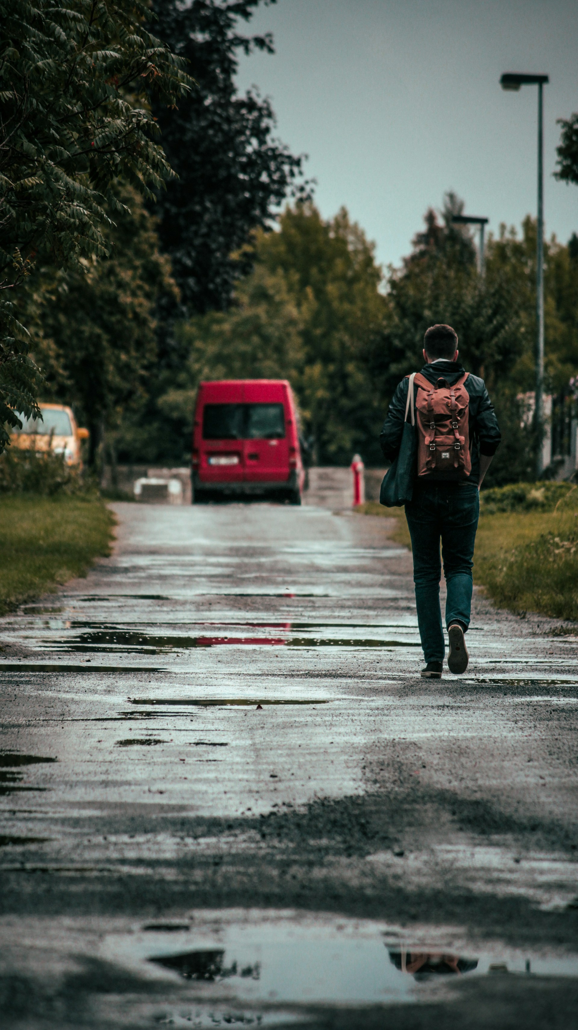 A man walking on the road | Source: Unsplash