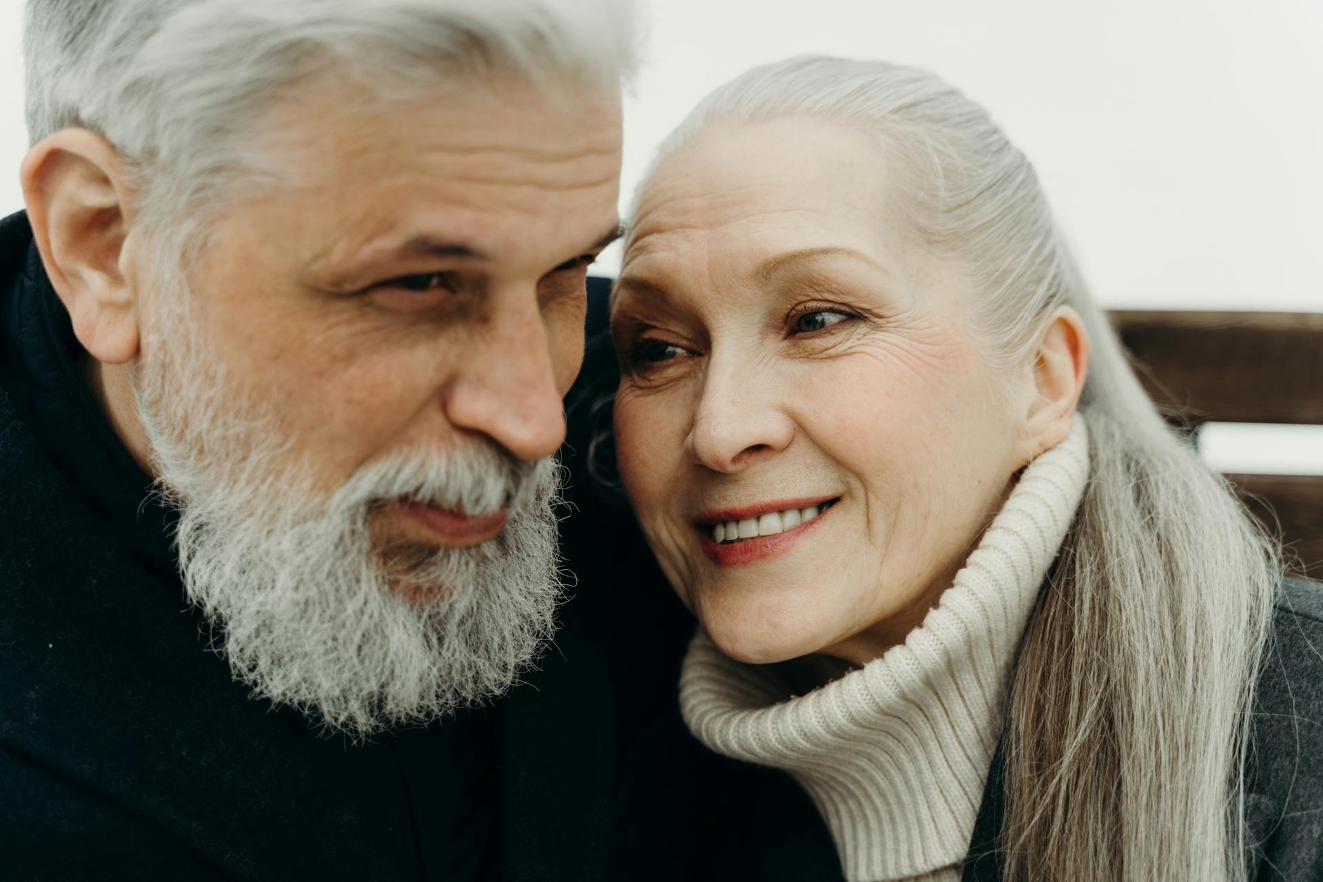 A senior couple smiling together | Source: Pexels