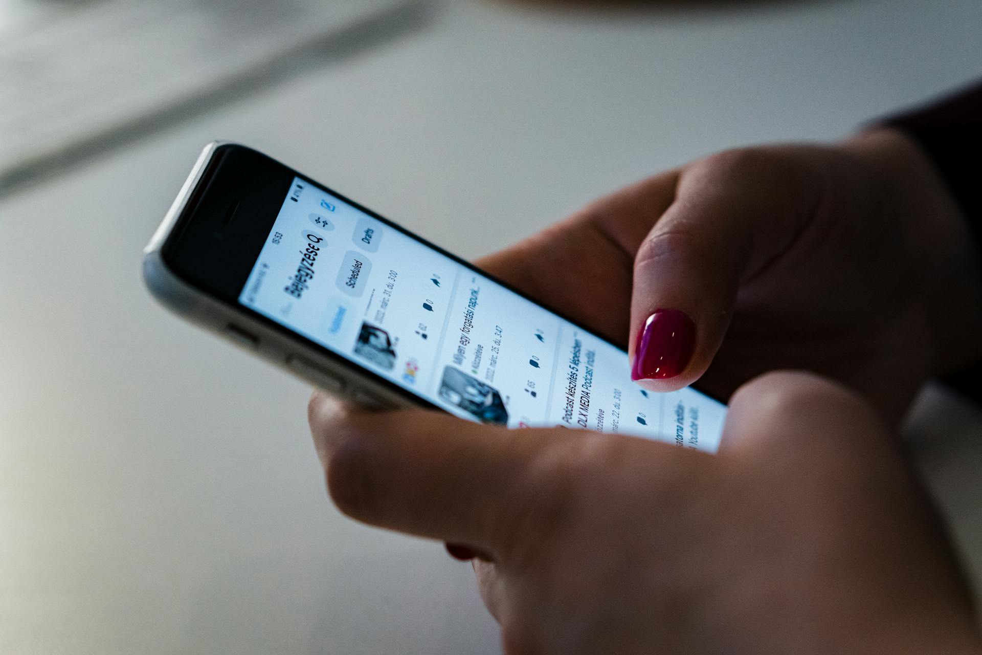 A woman using her phone | Source: Pexels