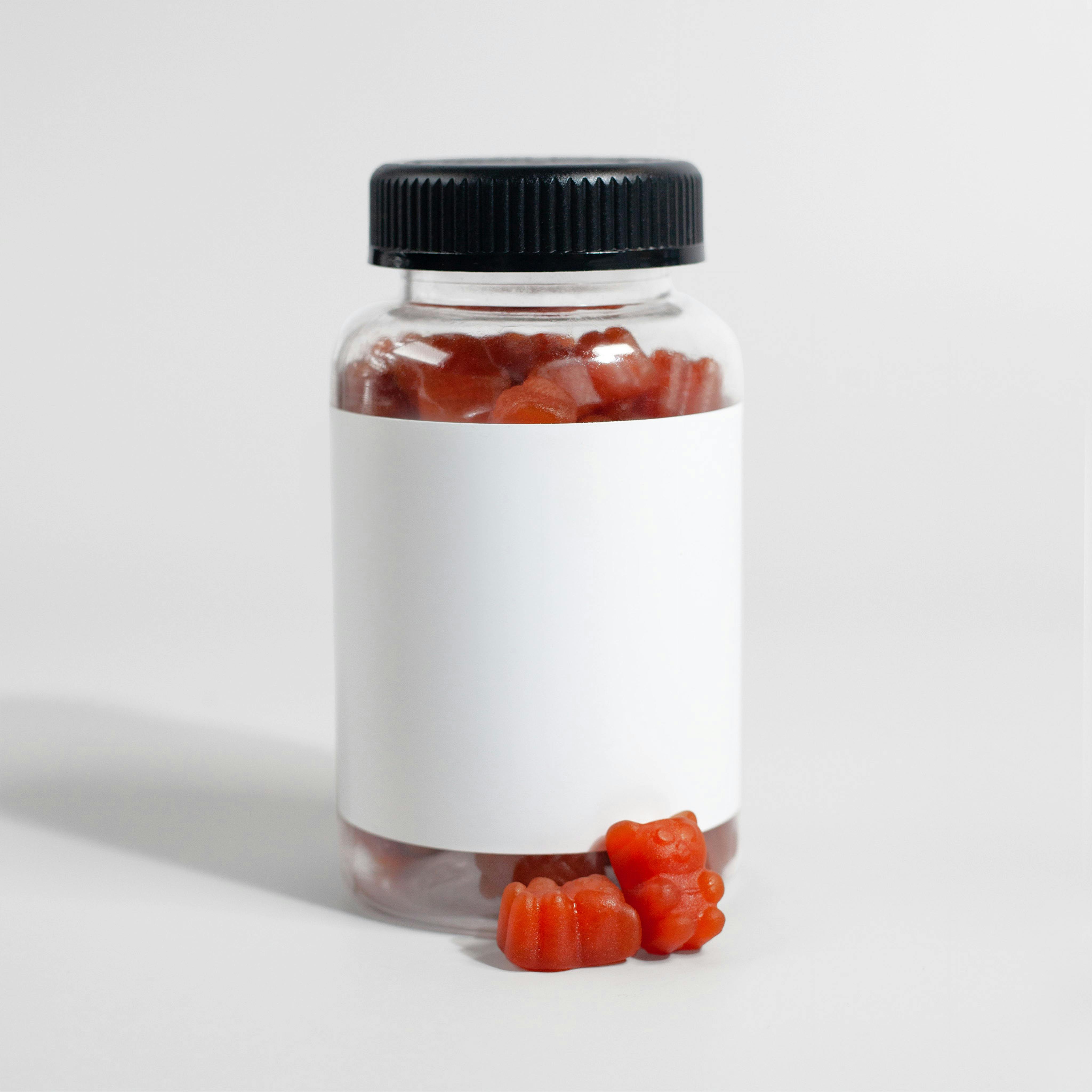 A bottle of gummy bear-shaped supplements | Source: Pexels