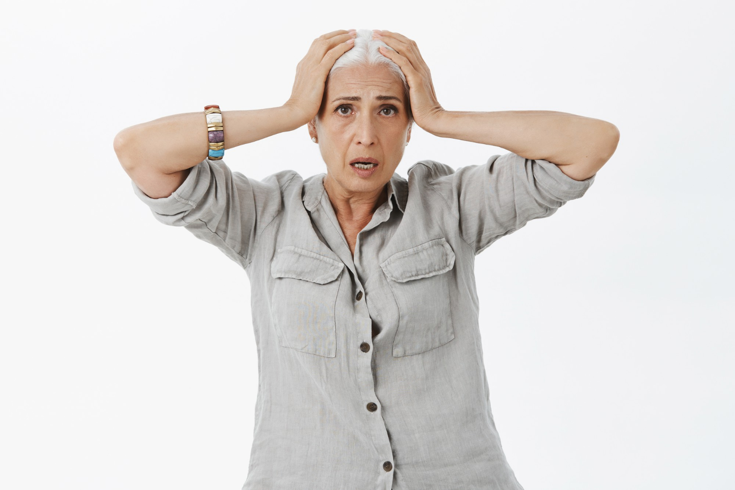 A worried senior woman | Source: Freepik