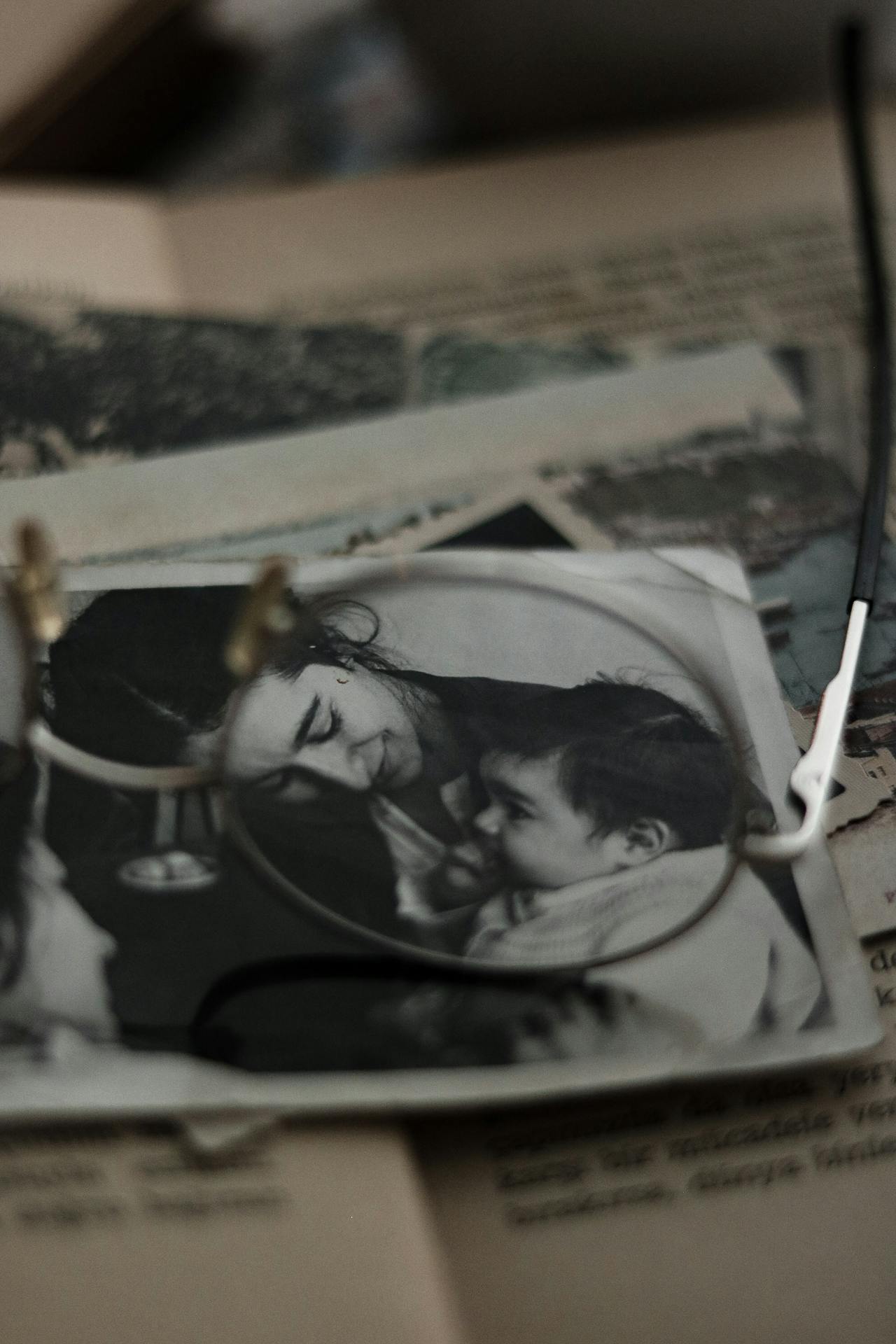An old photograph of a woman holding a baby | Source: Pexels