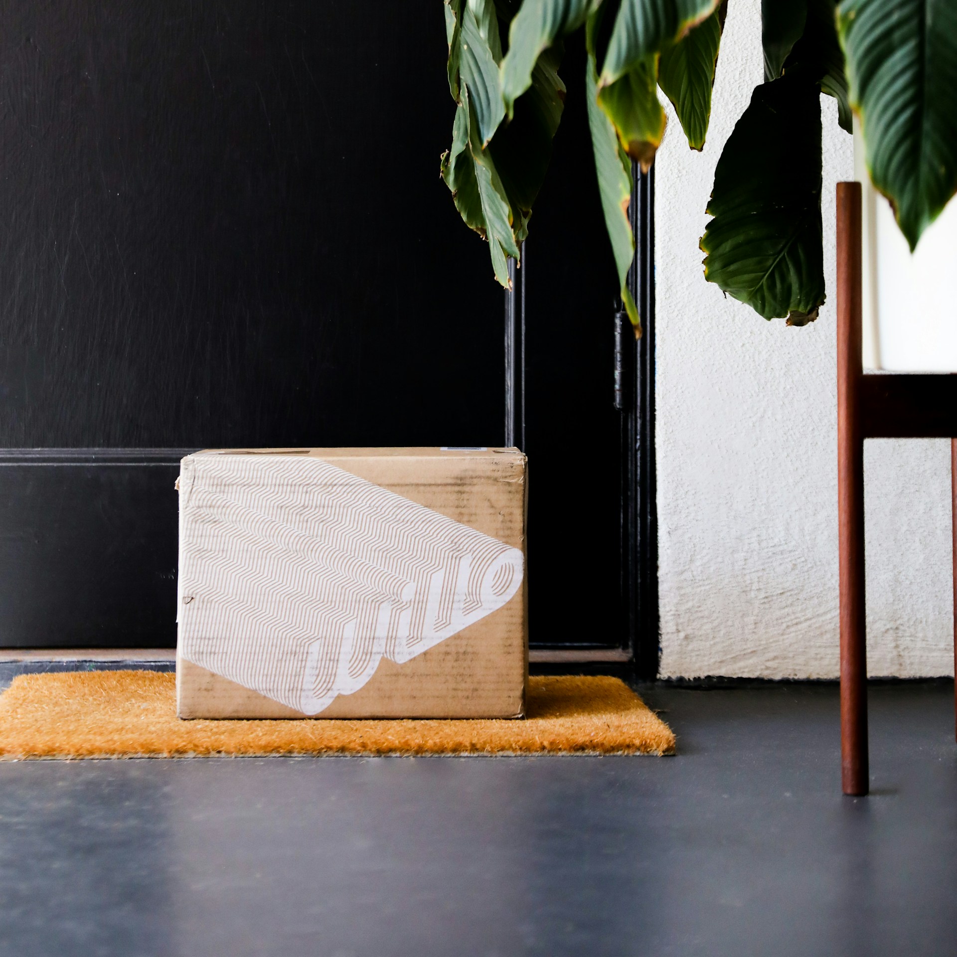 A box near a front door | Source: Unsplash