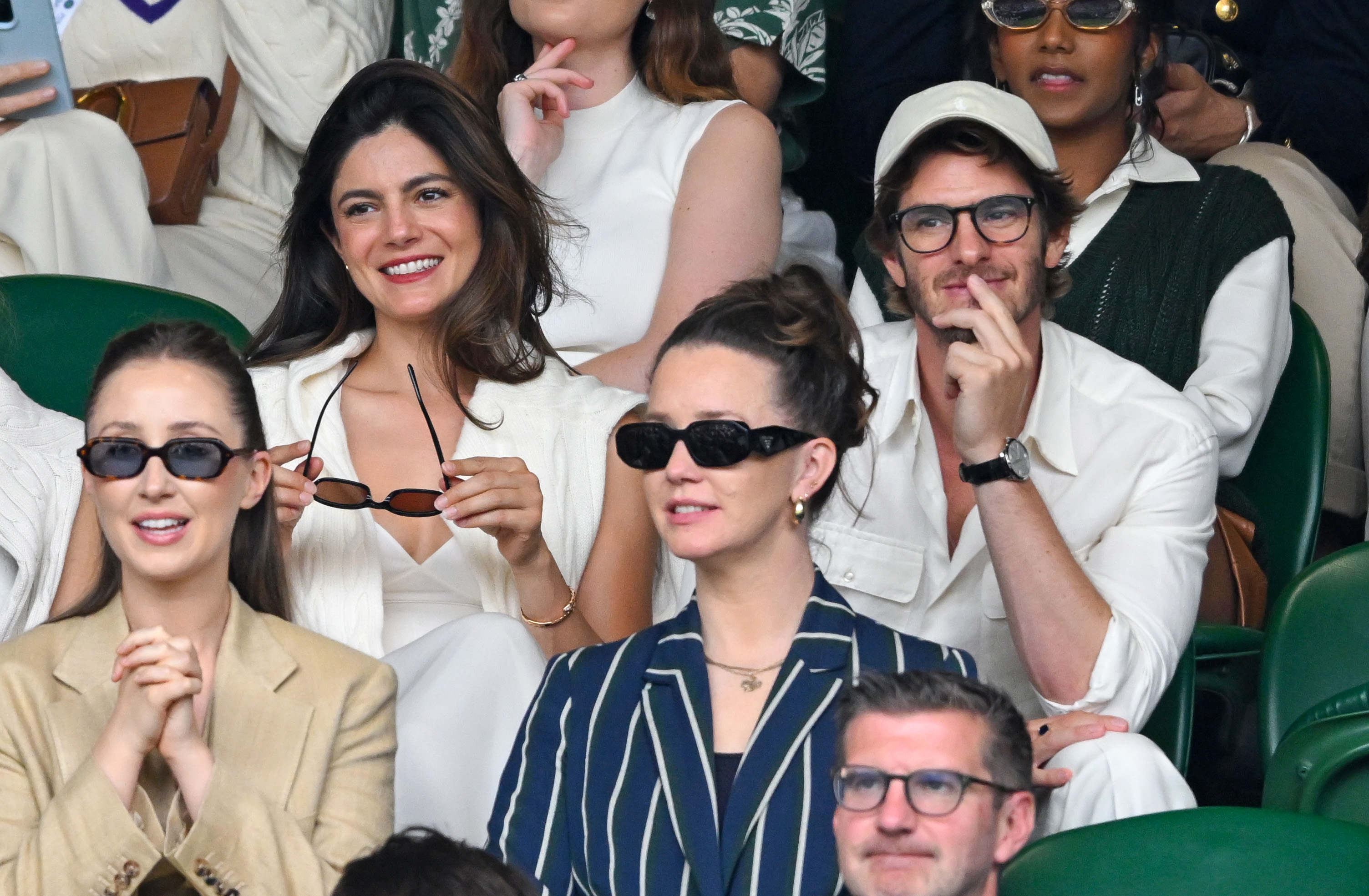 Monica Barbaro and Andrew Garfield attend day seven of the Wimbledon Tennis Championships on July 6, 2025 in London, England | Source: Getty Images