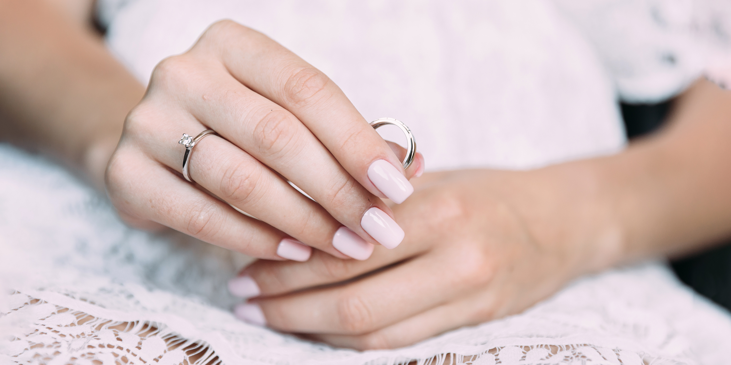 A bride holding a ring | Source: Shutterstock