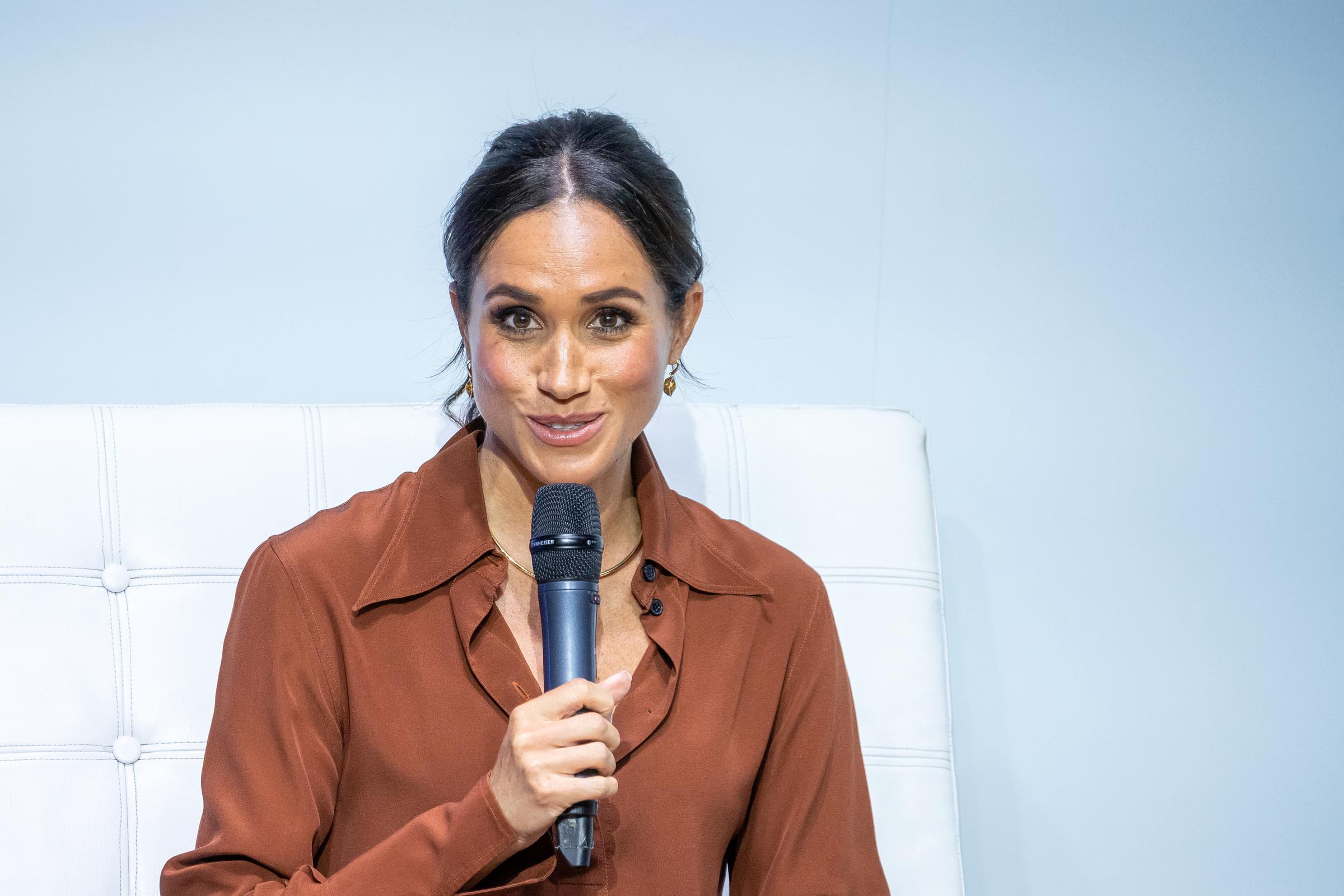 Meghan Markle speaks onstage at EAN University in Bogota, Colombia, on August 15, 2024 | Source: Getty Images