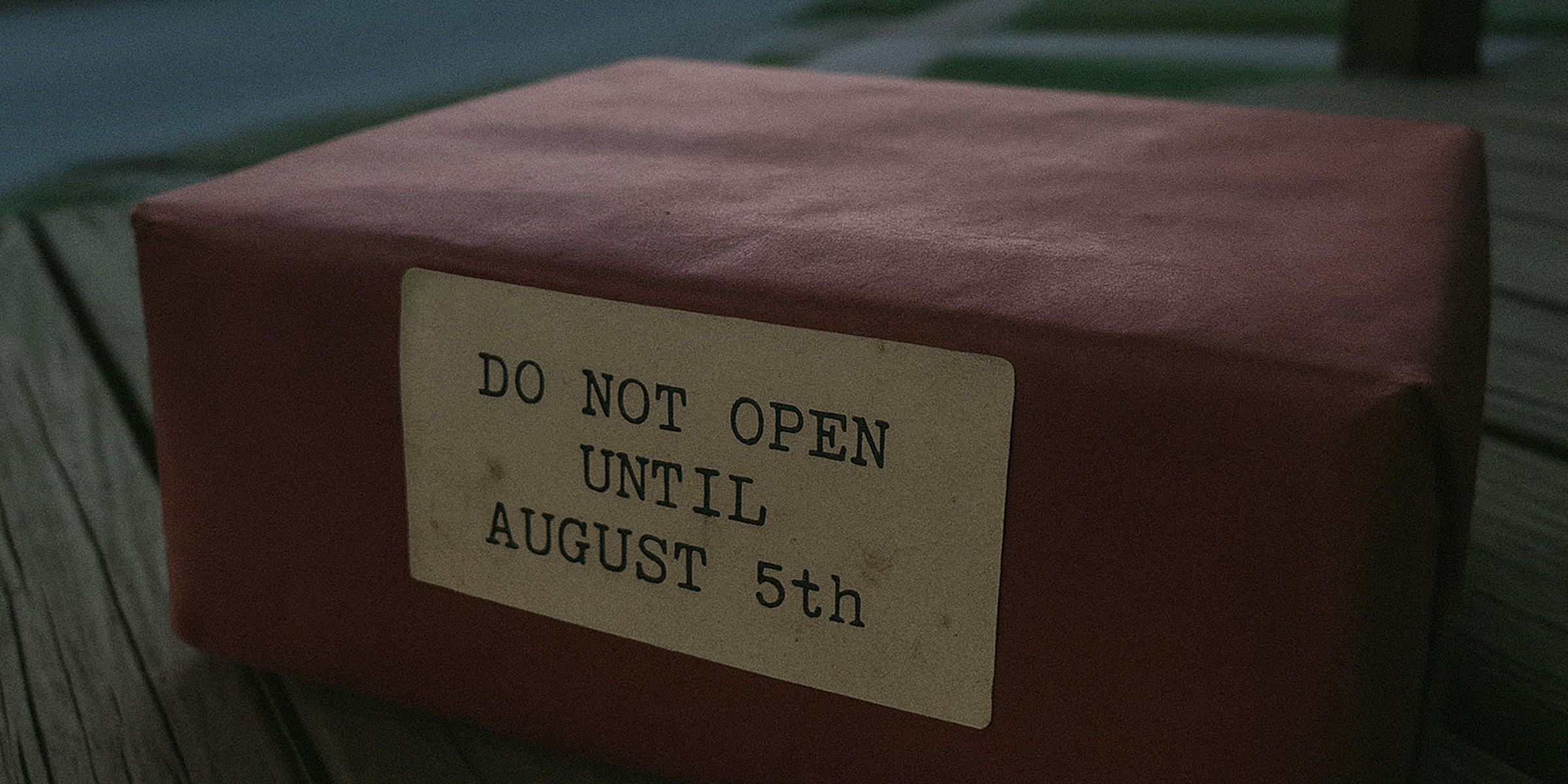 Red box left on the porch | Source: Sora