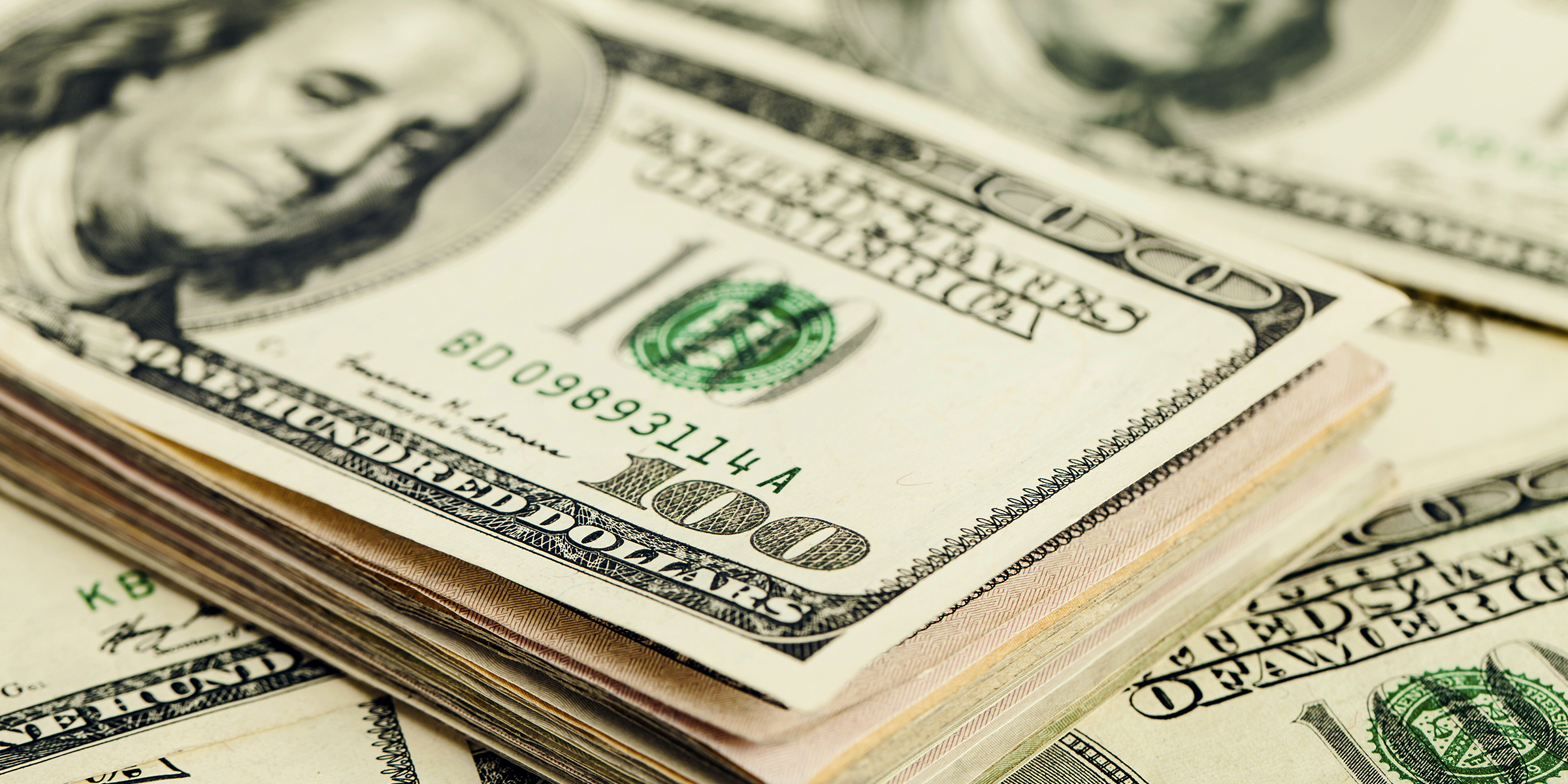 Wads of money | Source: Shutterstock