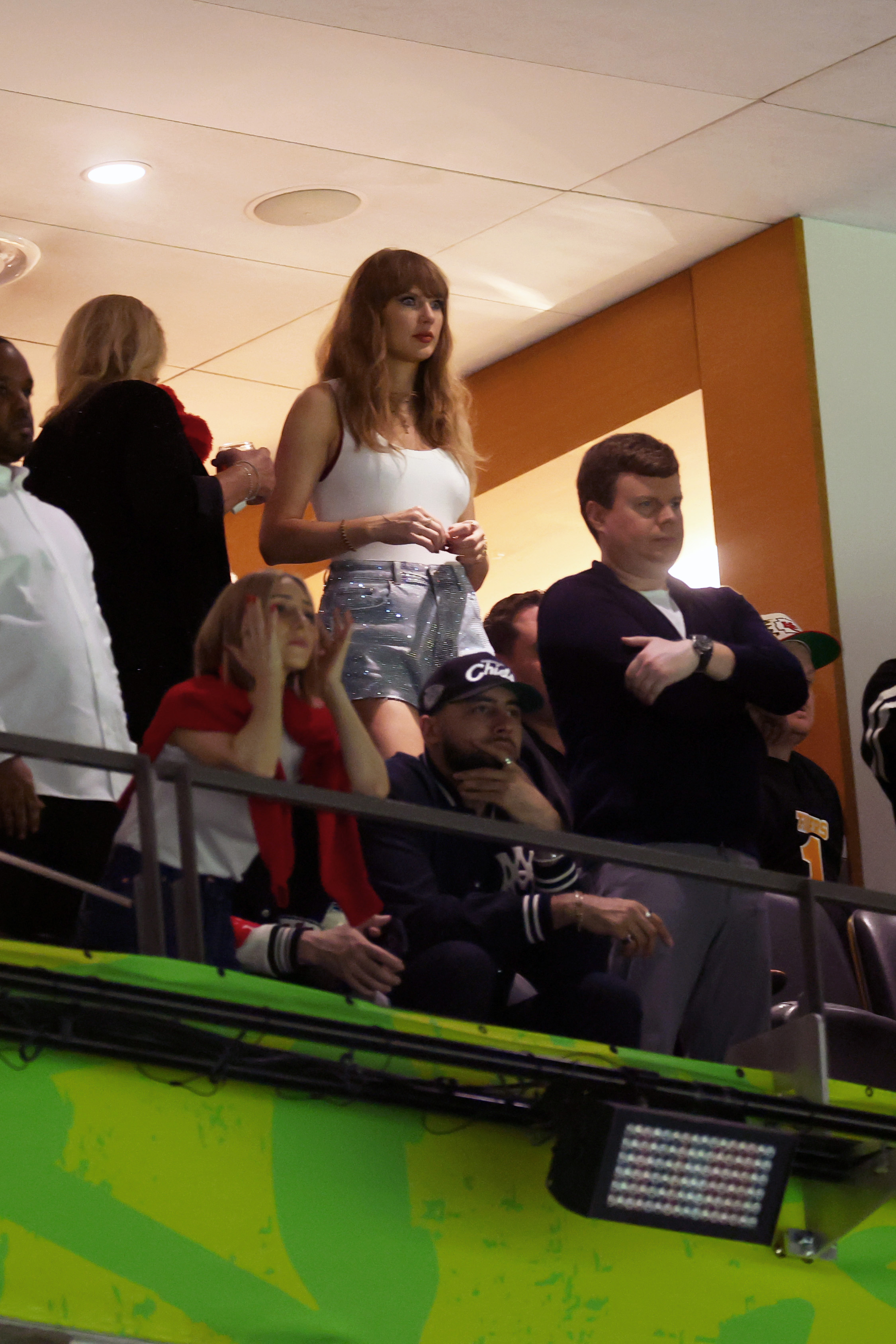 Ashley Avignone, Taylor Swift, and Ross Travis look anxious during Super Bowl LIX on February 9, 2025 | Source: Getty Images