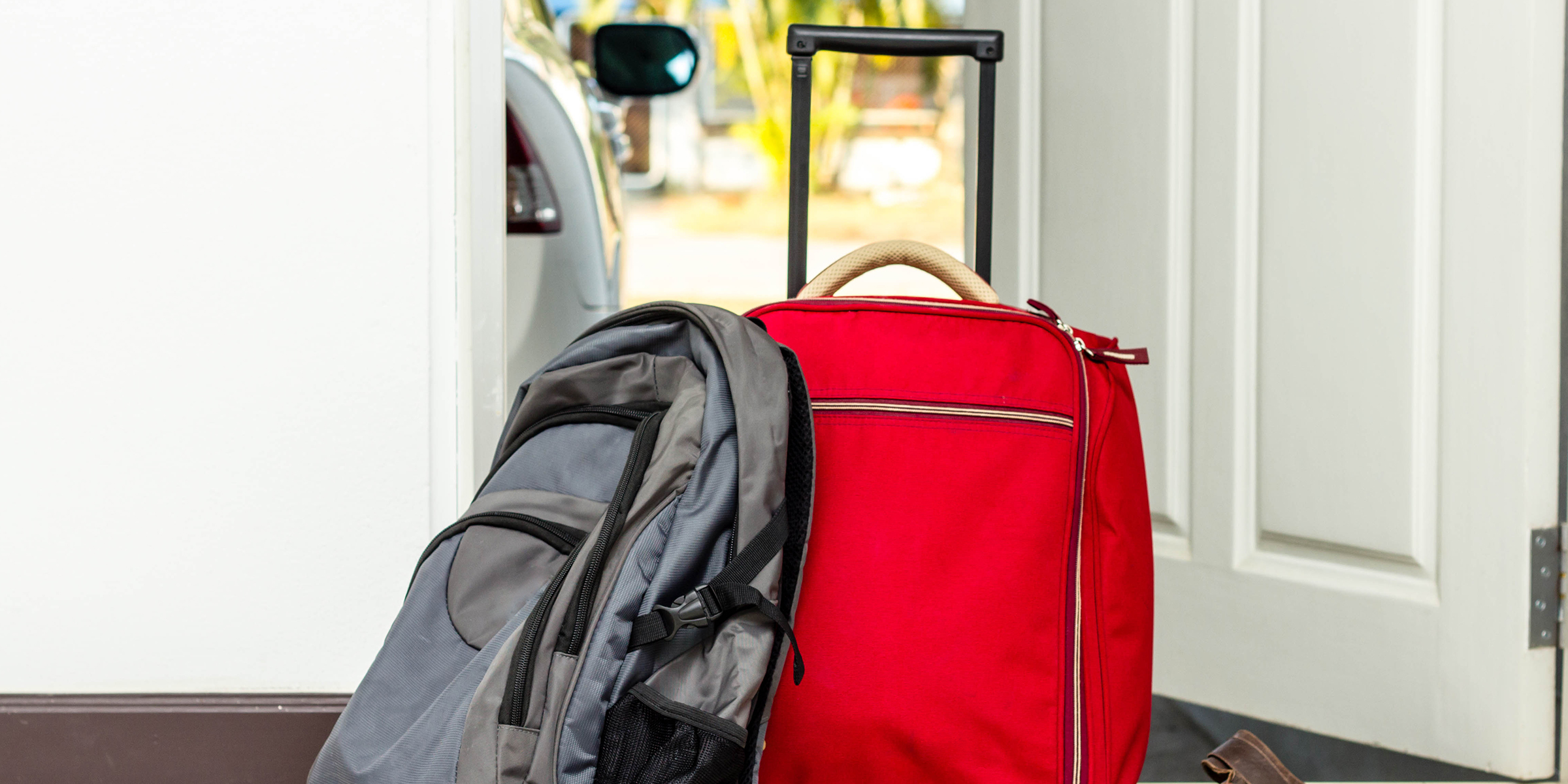 Bags by a door | Source: Shutterstock