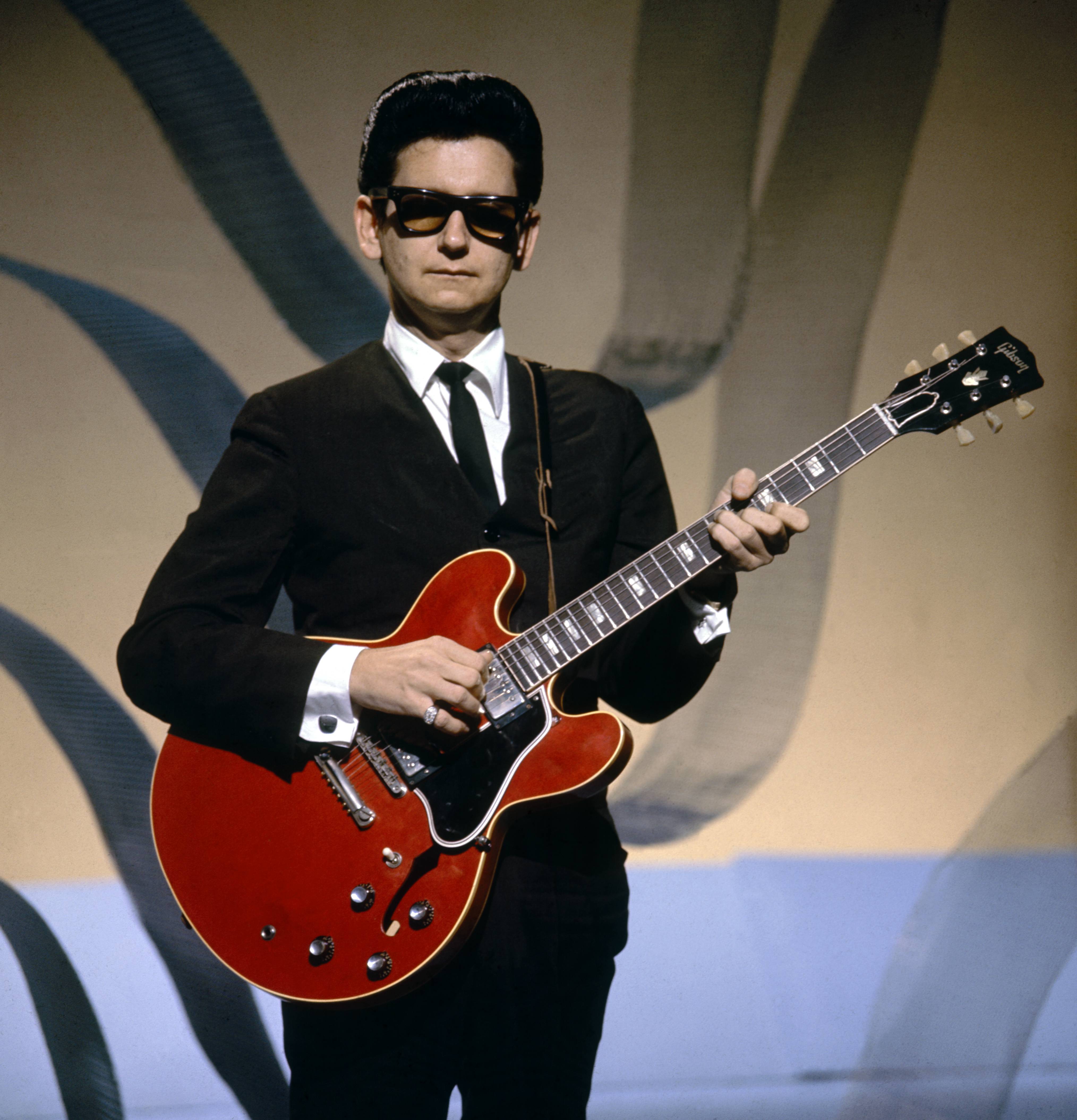 Roy Orbison became one of music's most distinctive voices, known for hits such as "Crying," "In Dreams," and "Oh, Pretty Woman." His sons later helped tell the fuller story of the private man behind the famous dark glasses. | Source: Getty Images