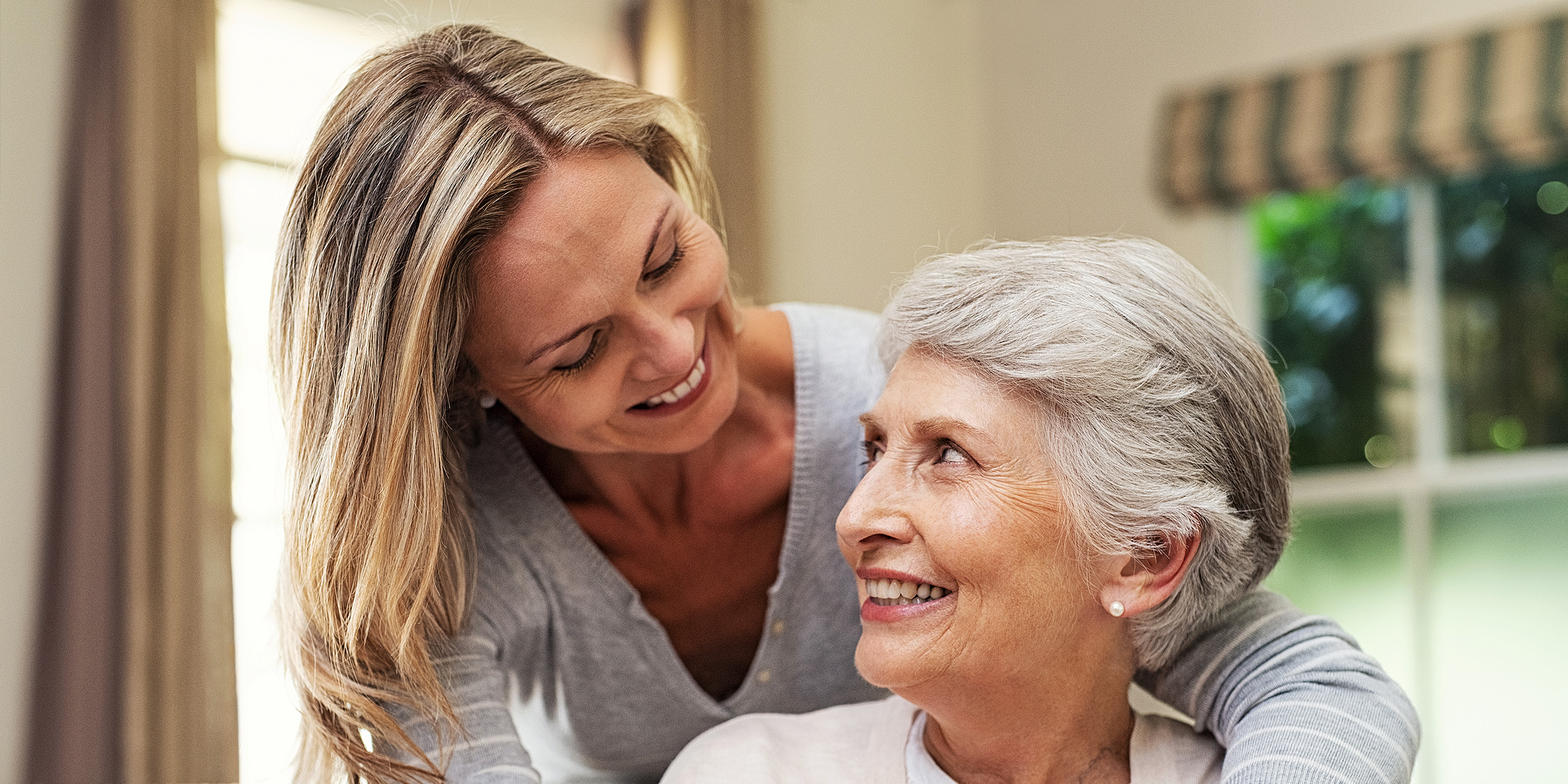 A woman with her mother | Source: Shutterstock