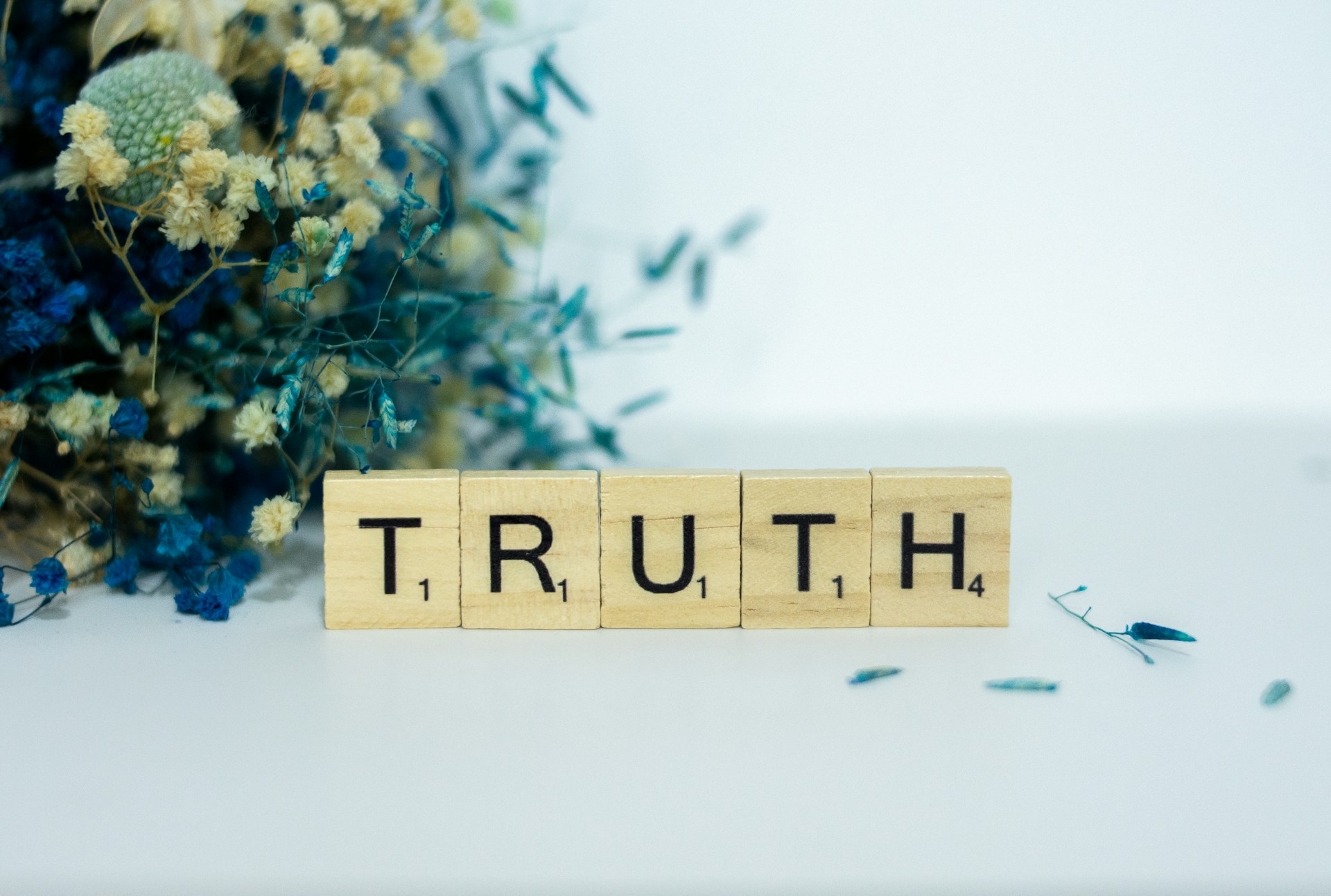 Scrabble tiles on a surface | Source: Unsplash