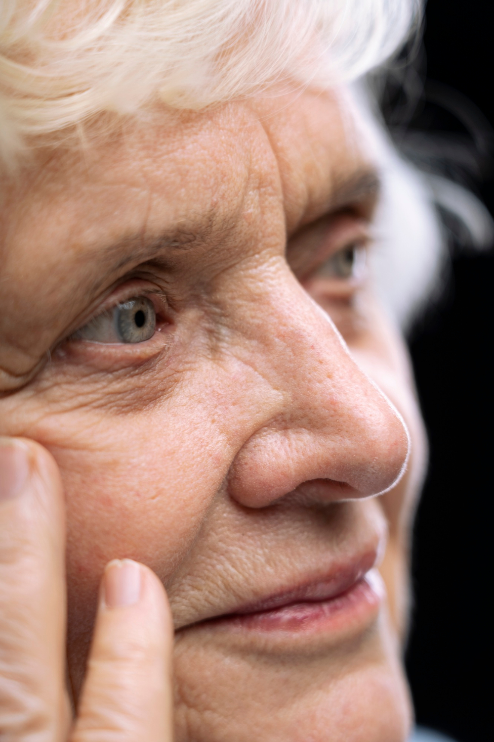 An emotional older woman looking at someone | Source: Freepik
