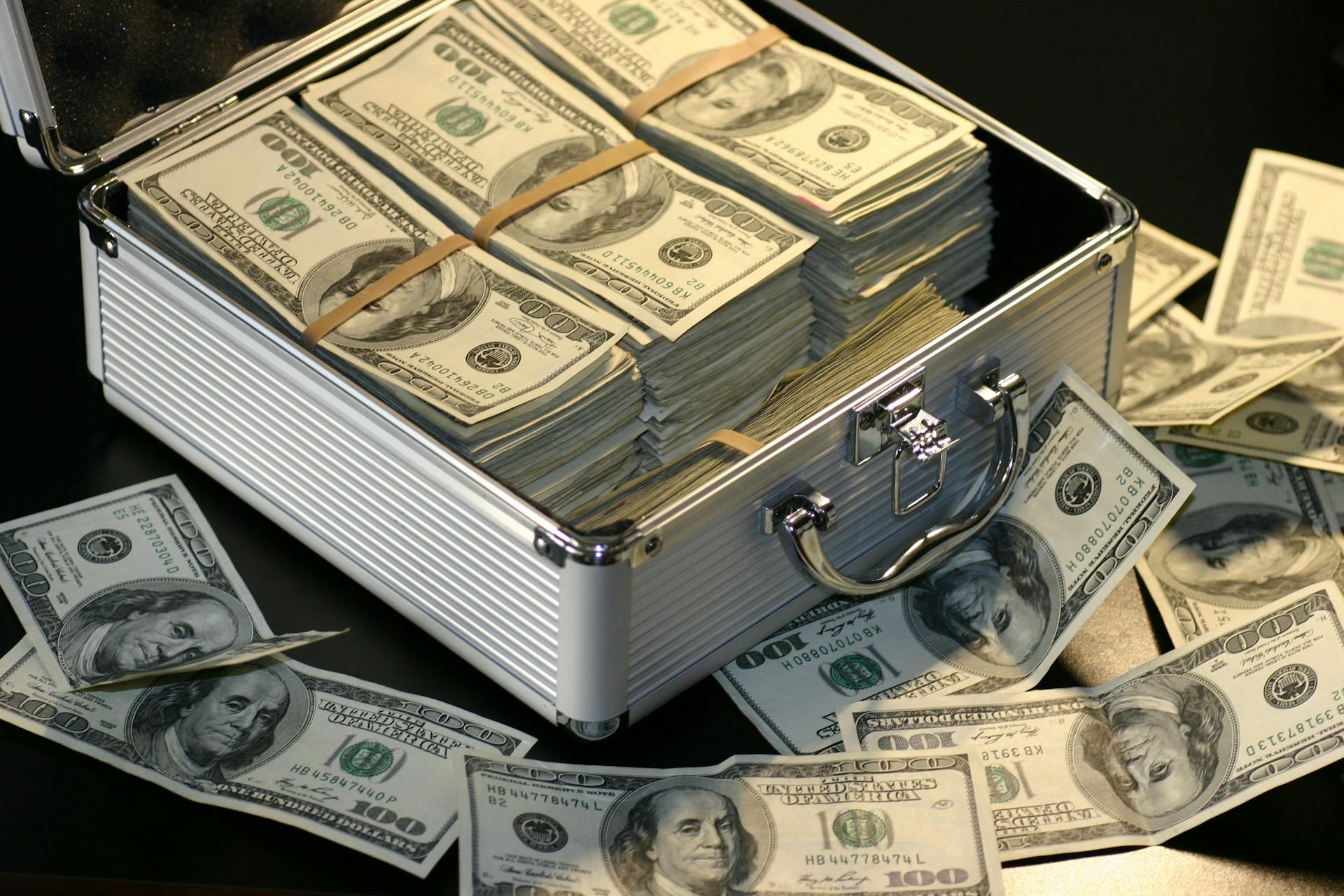 Money stashed in a metal case | Source: Pexels