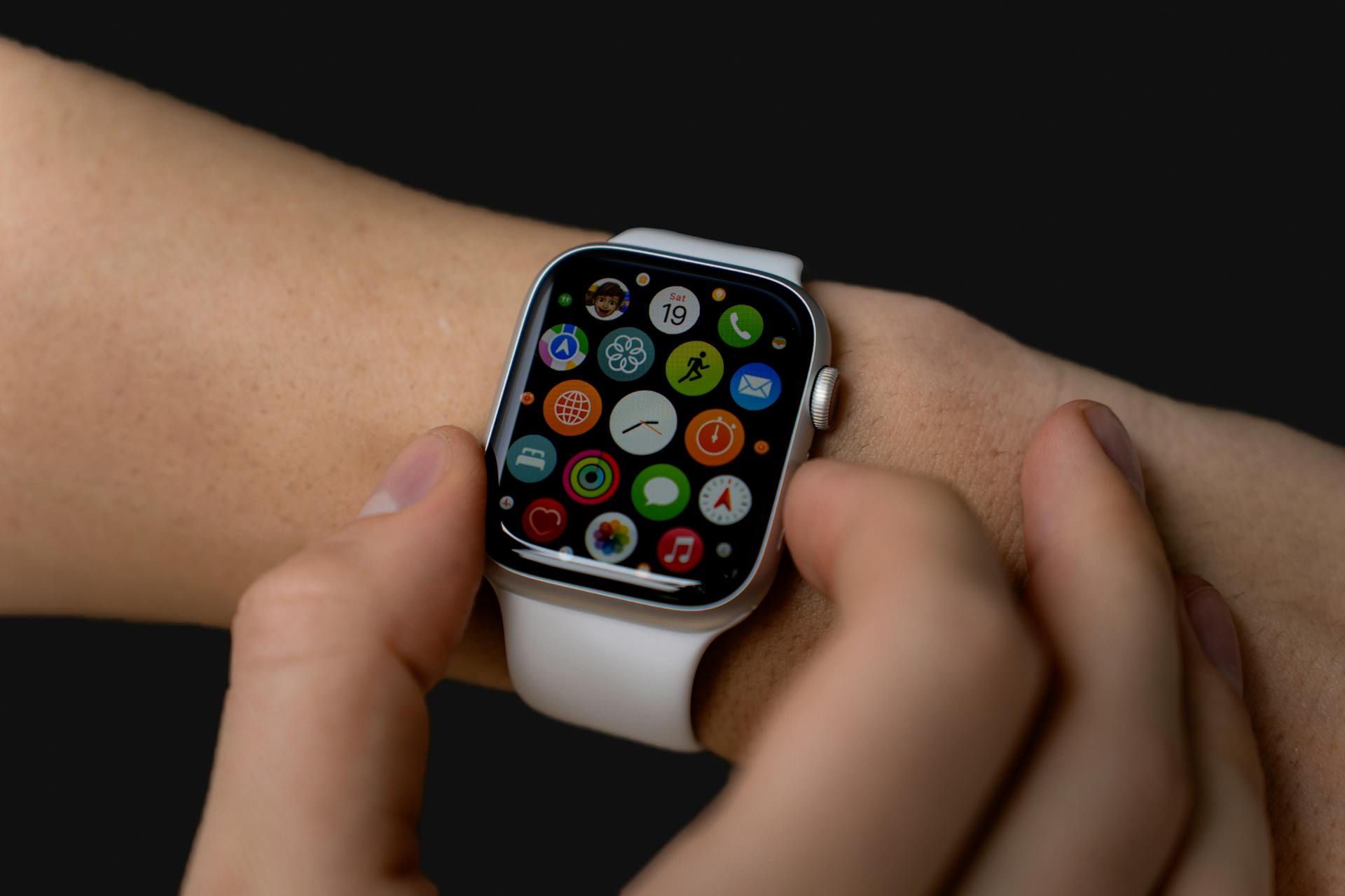 A woman checking her watch | Source: Pexels
