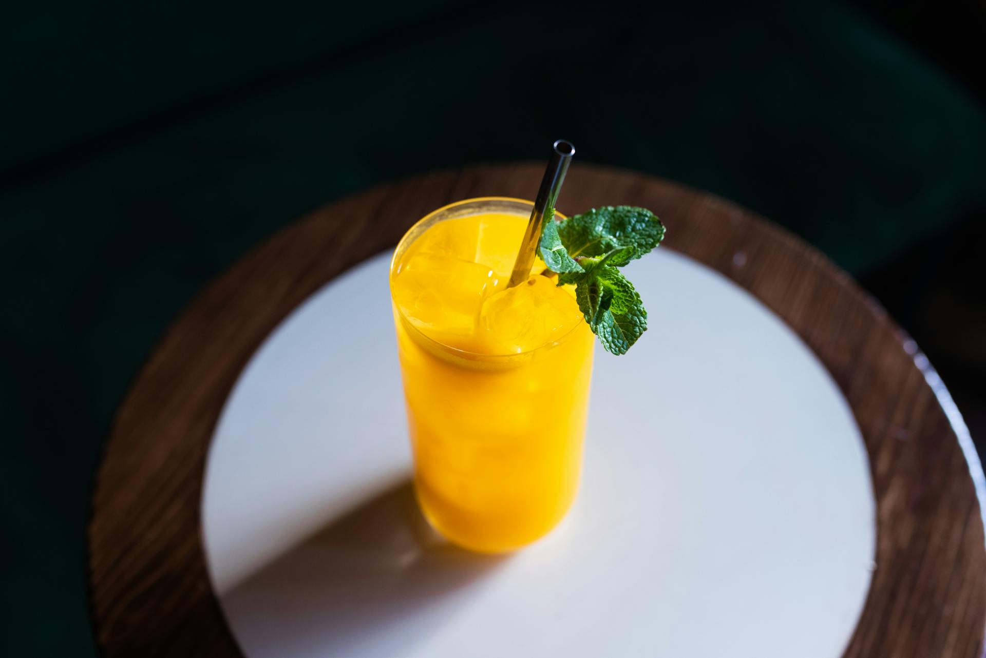 A glass of iced beverage on a table | Source: Pexels