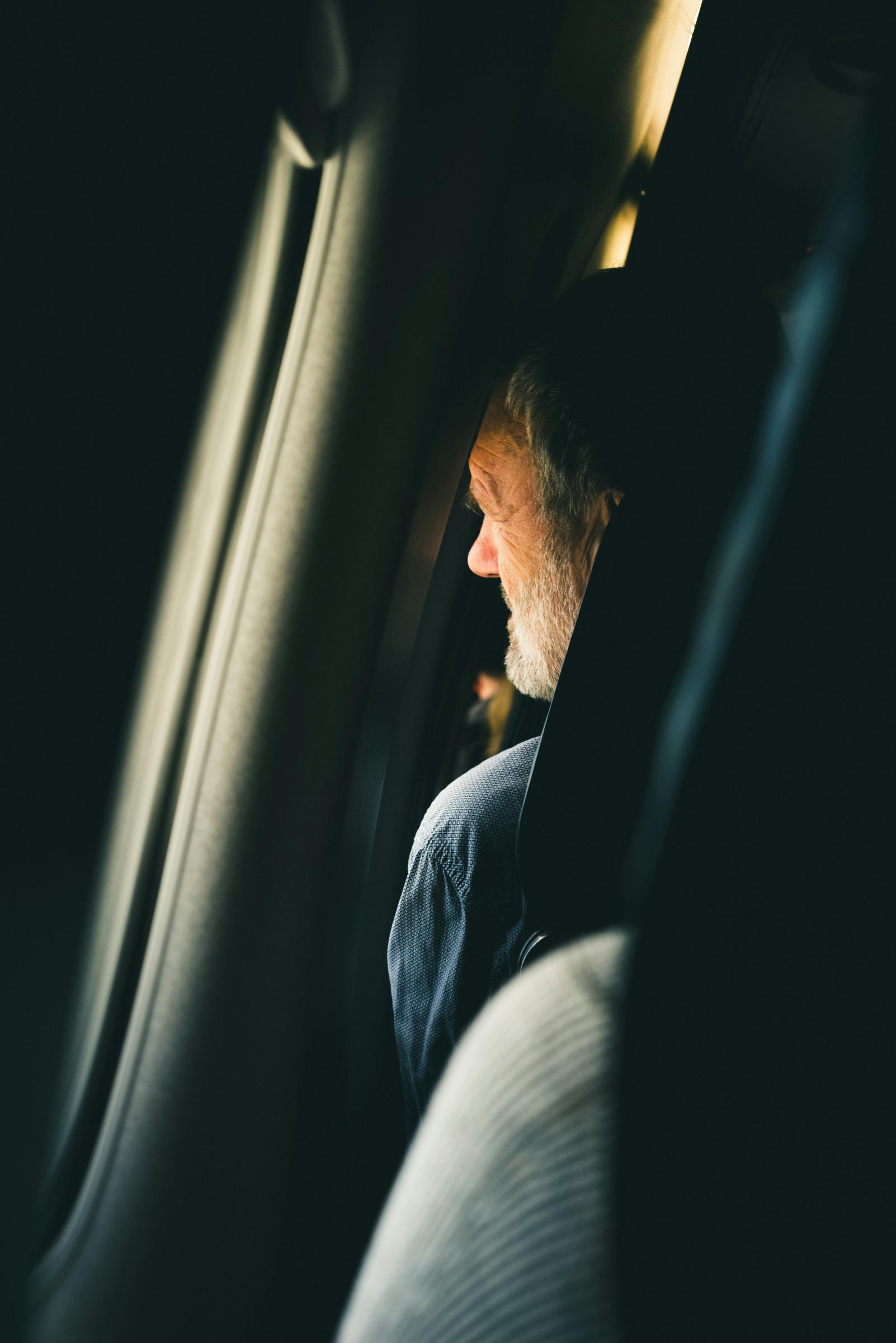 Man sitting on an airplane seat | Source: Pexels
