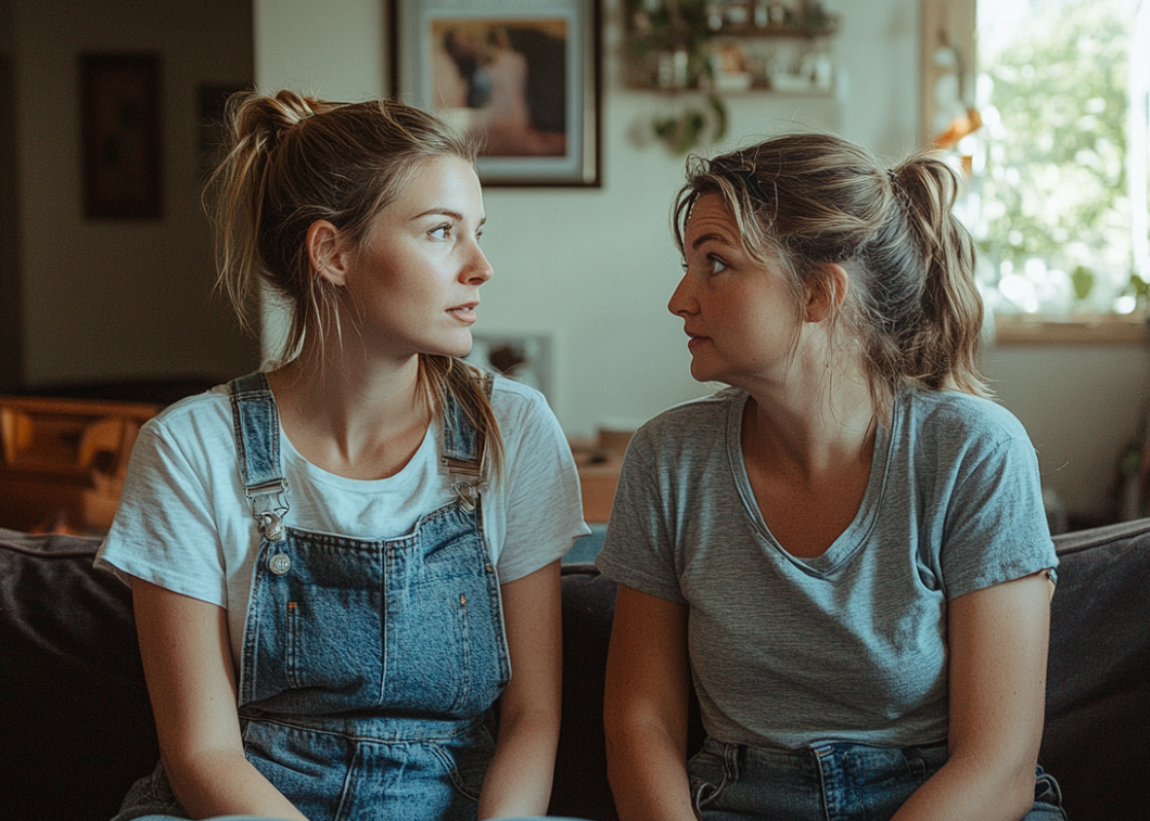 Two women having a conversation | Source: Midjourney