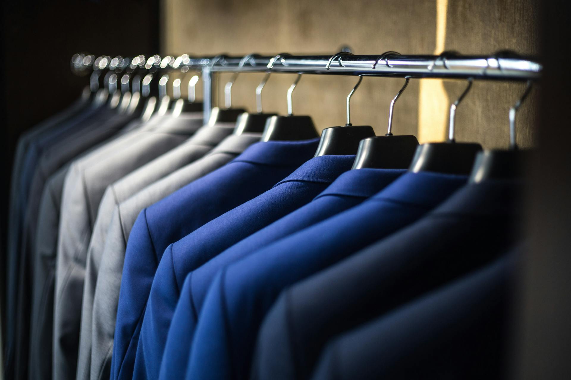Suits hanging in a closet | Source: Pexels