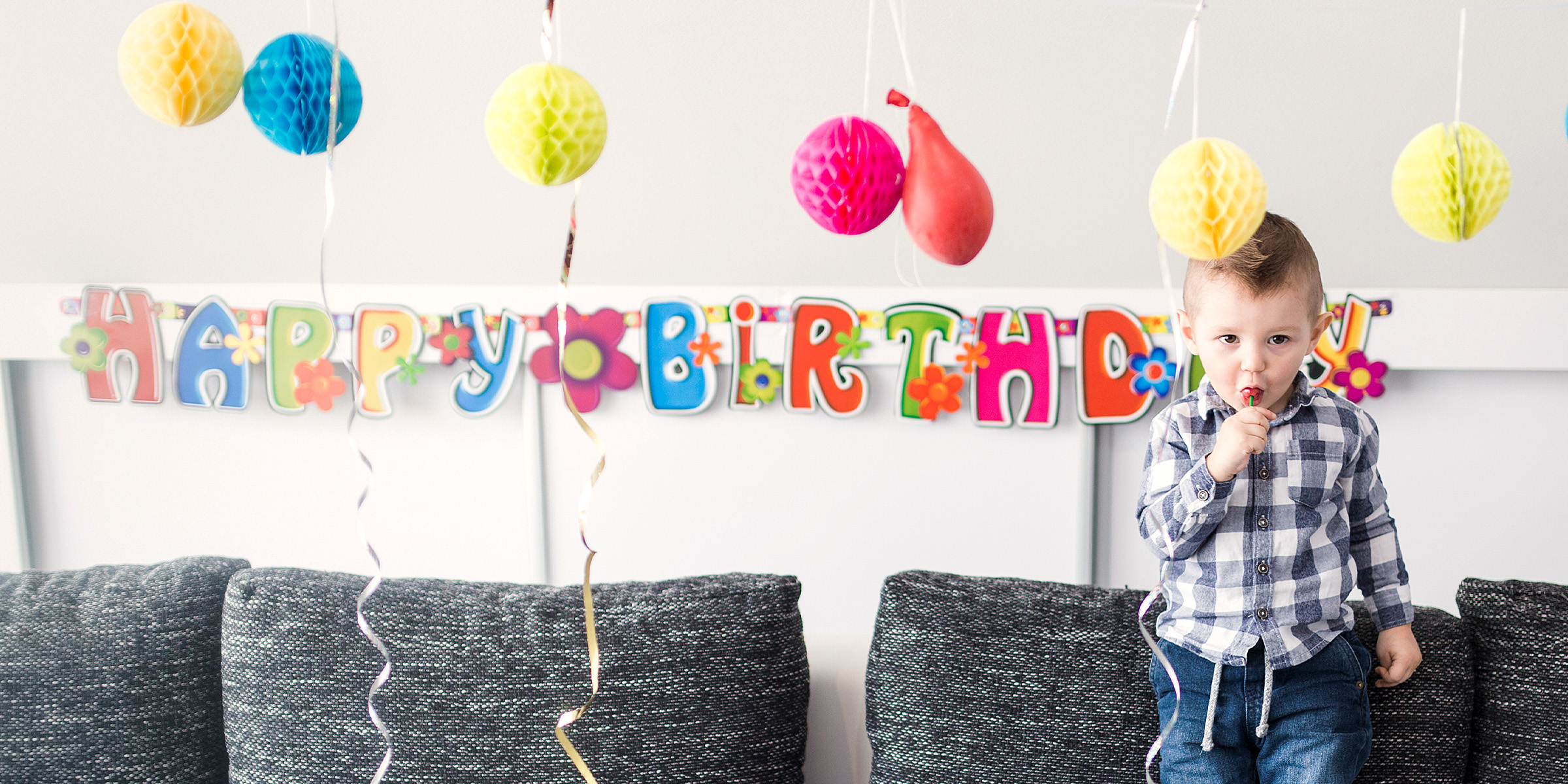 A little boy at his birthday party | Source: Freepik
