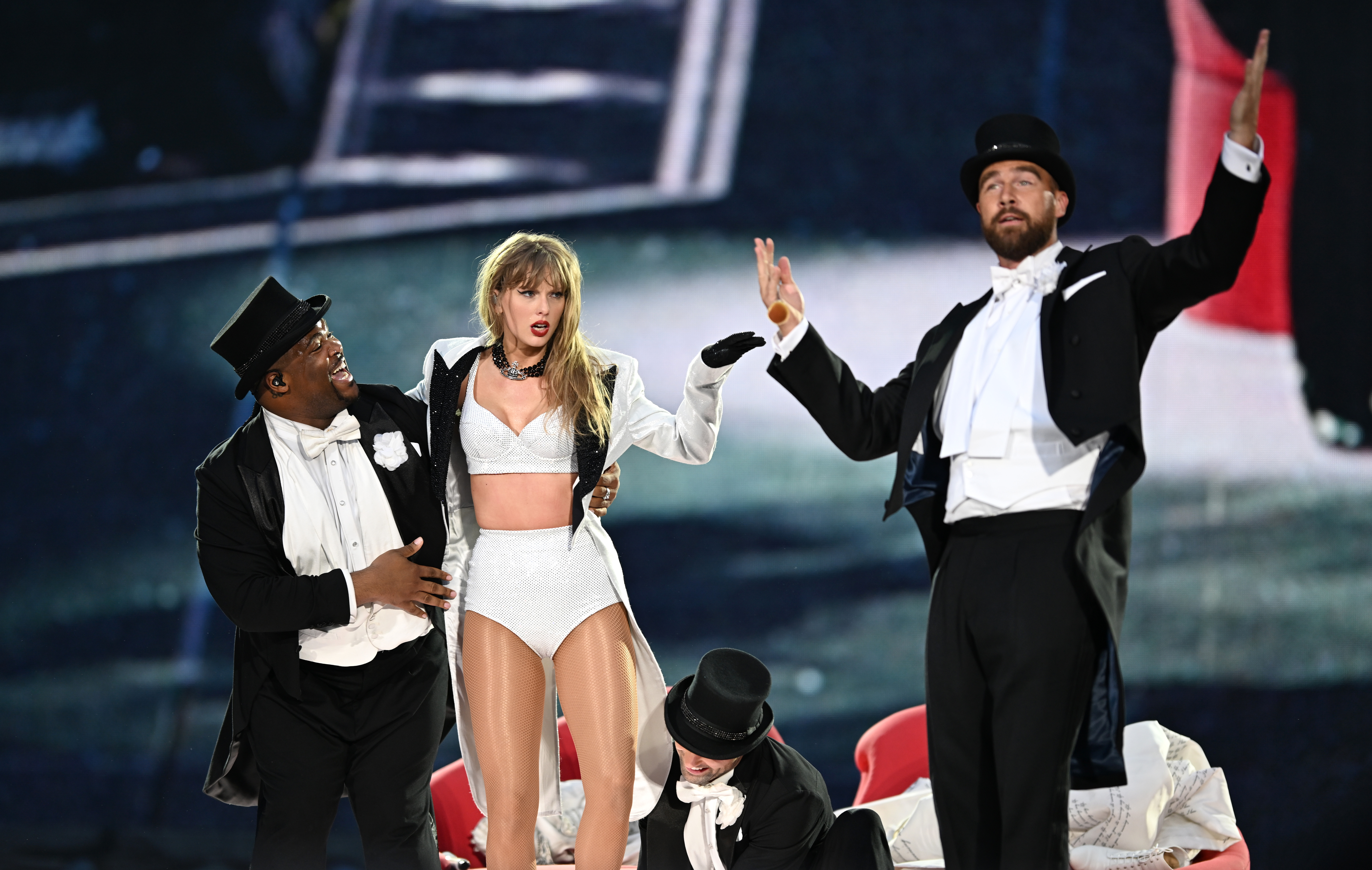 Taylor Swift is joined on stage by Travis Kelce during "Taylor Swift | The Eras Tour" at Wembley Stadium in London, England, on June 23, 2024 | Source: Getty Images