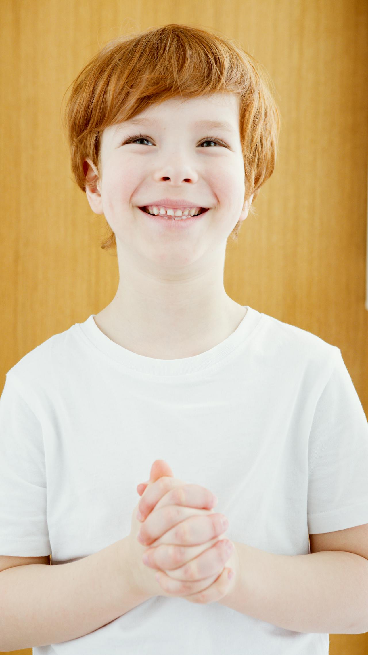 A boy smiling | Source: Pexels