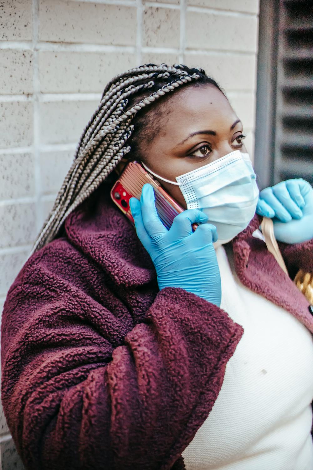 A hospital professional talking on her phone | Source: Pexels