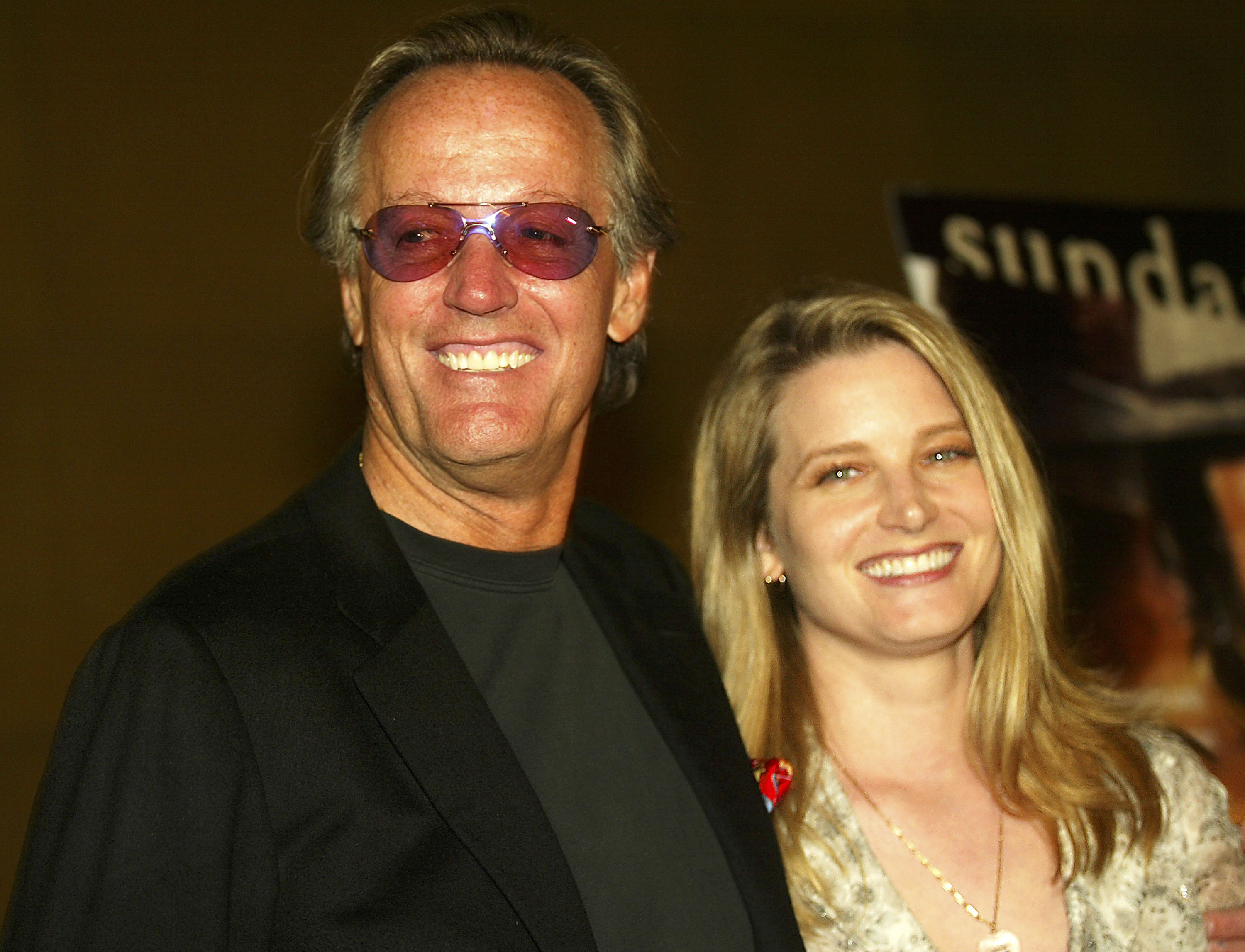 Actor/director Peter Fonda and daughter Bridget Fonda arrive at a screening of the newly restored "The Hired Hand," marking the 1971 directorial debut of Peter Fonda, at the Egyptian Theatre on October 22, 2003 | Source: Getty Images