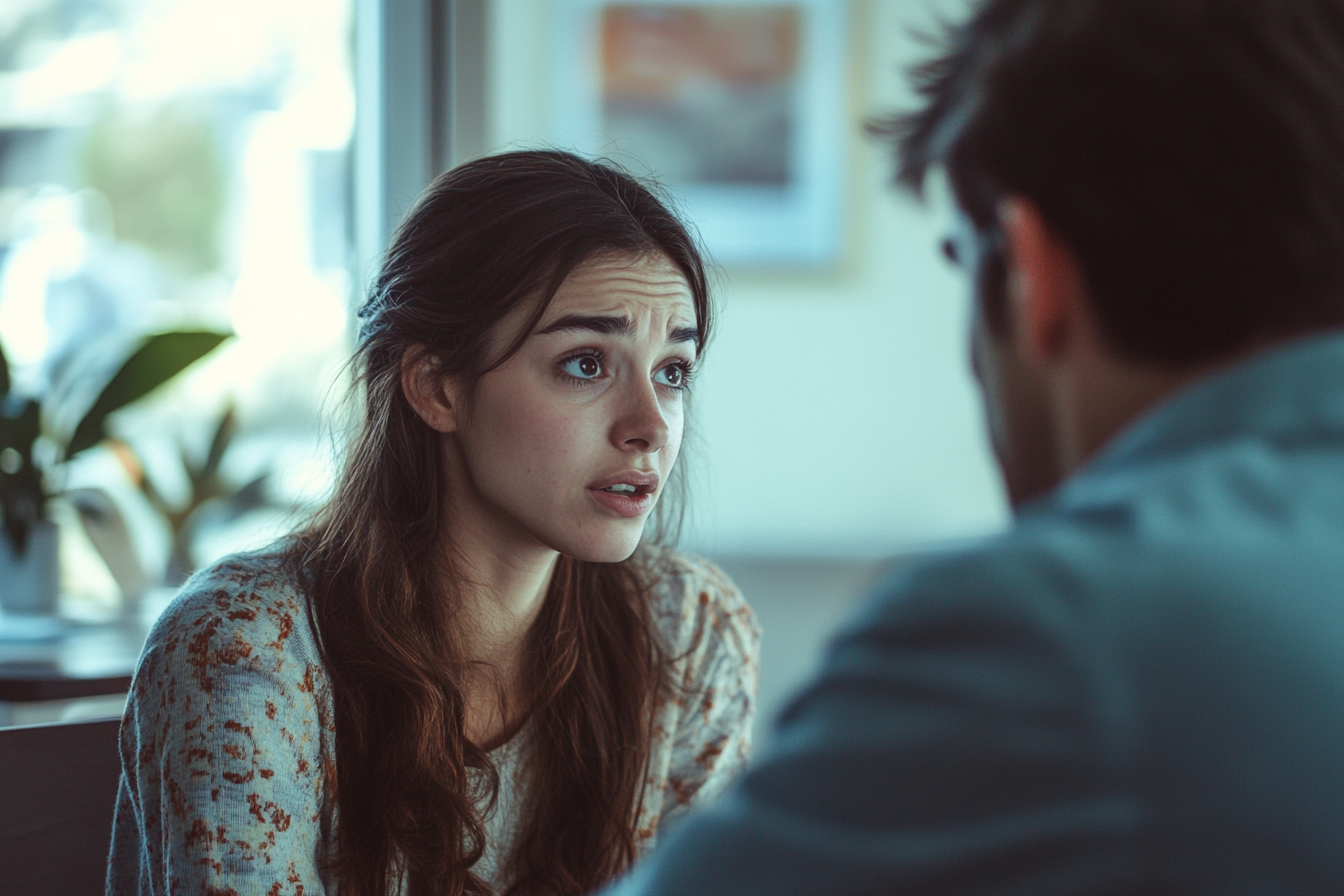 Woman having a conversation with a doctor | Source: Midjourney