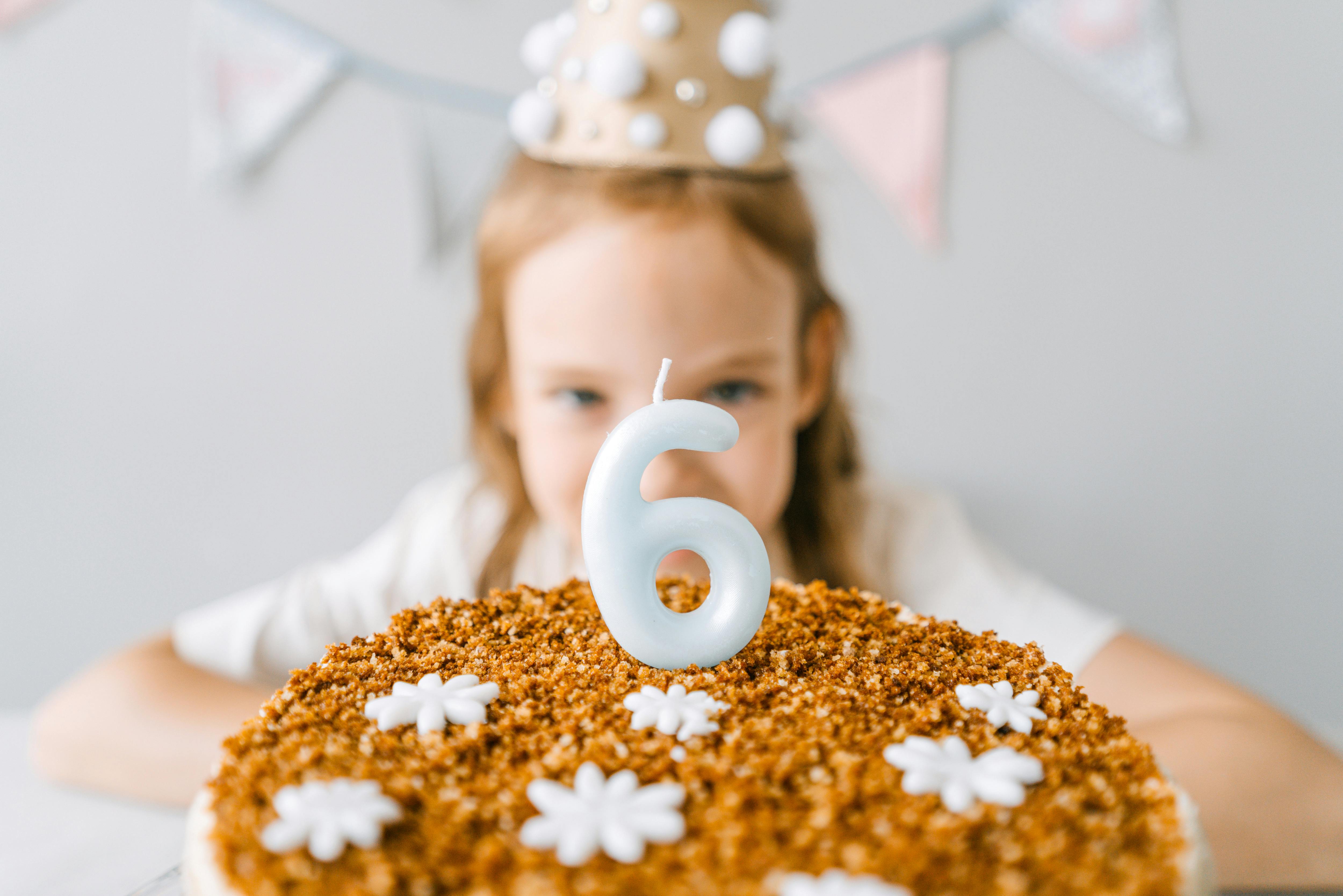 A little girl celebrating her sixth birthday | Source: Pexels