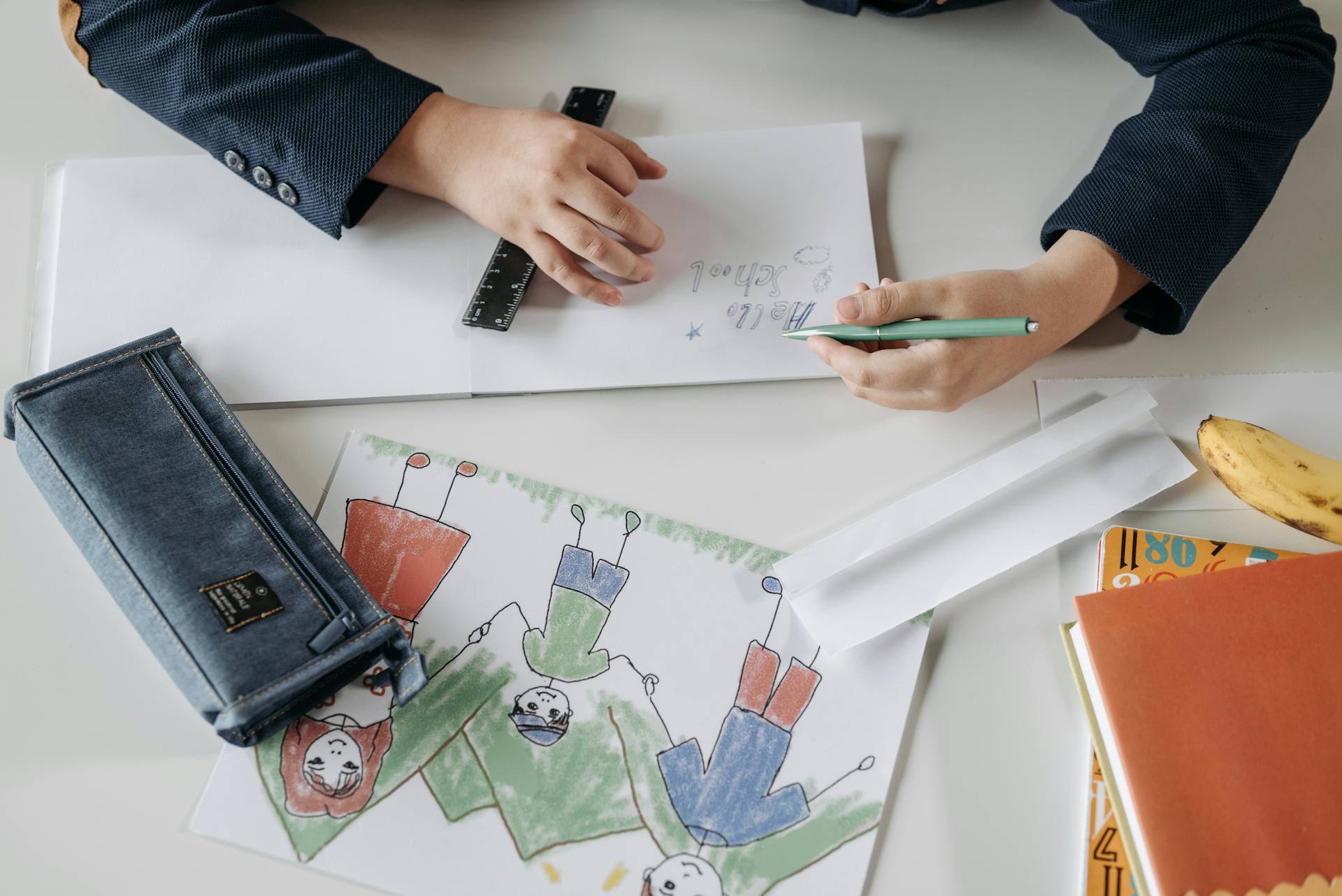 A child writing on paper | Source: Pexels