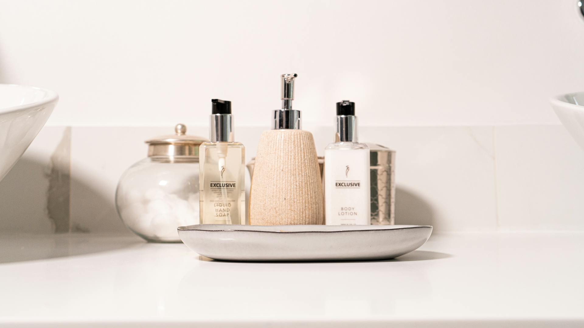 Bathroom essentials on a sink | Source: Pexels