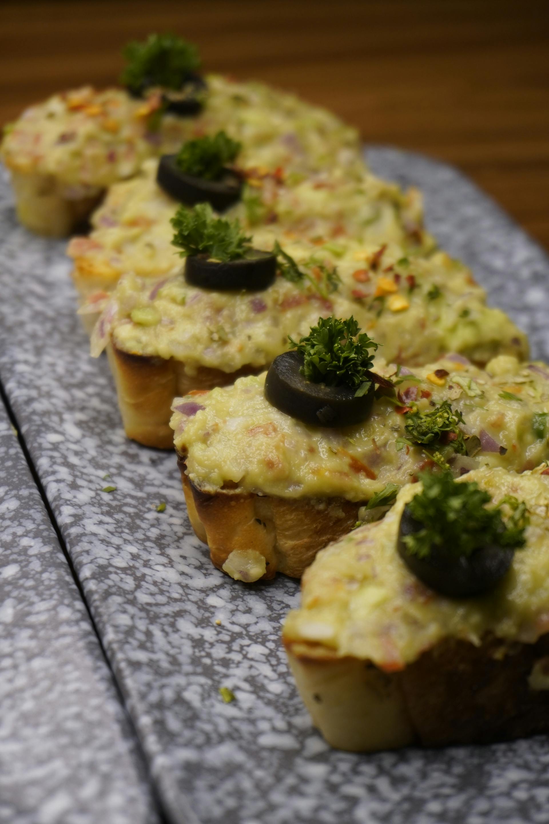 Appetizers arranged on plates | Source: Pexels