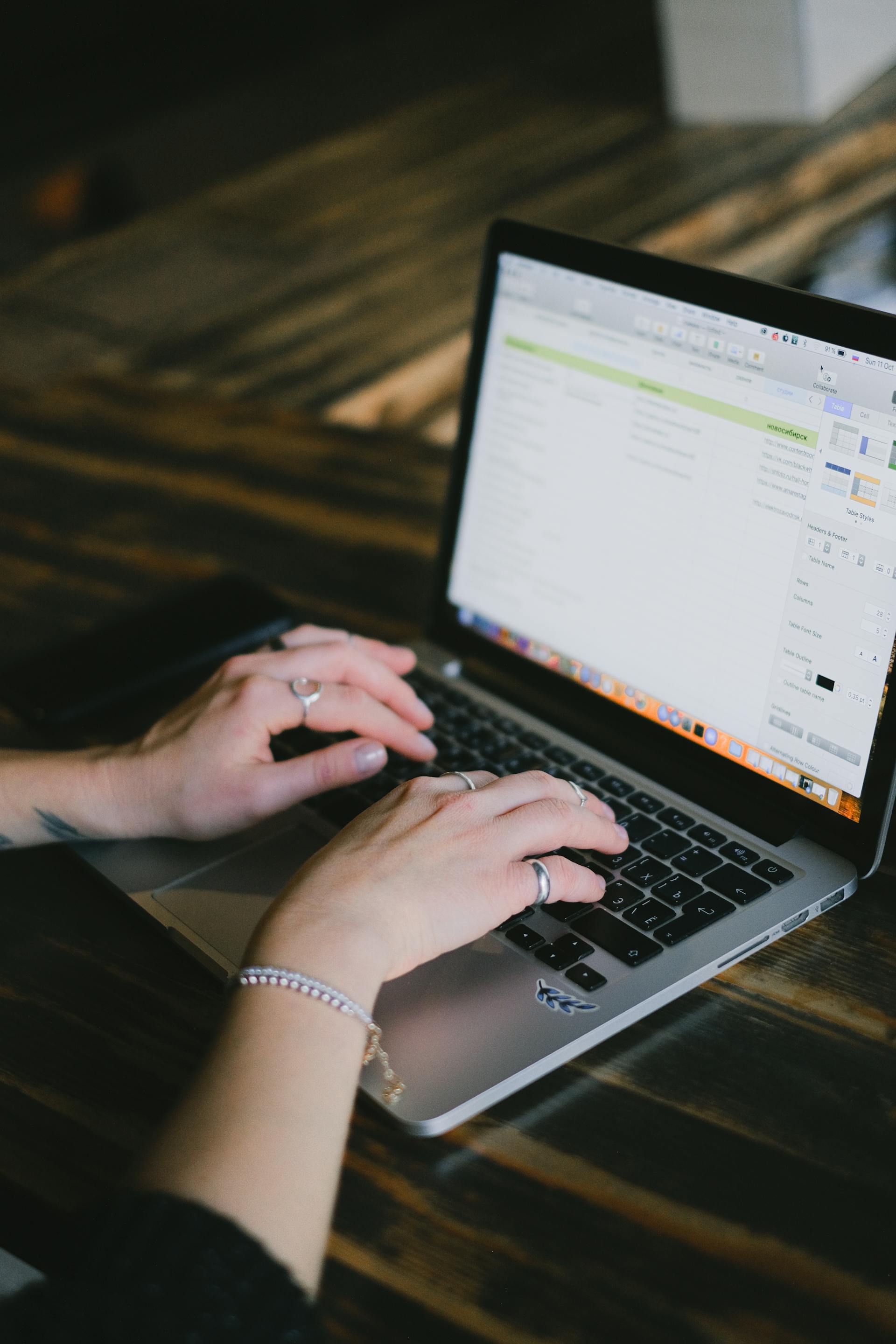 A close-up shot of a woman working on her laptop | Source: Pexels
