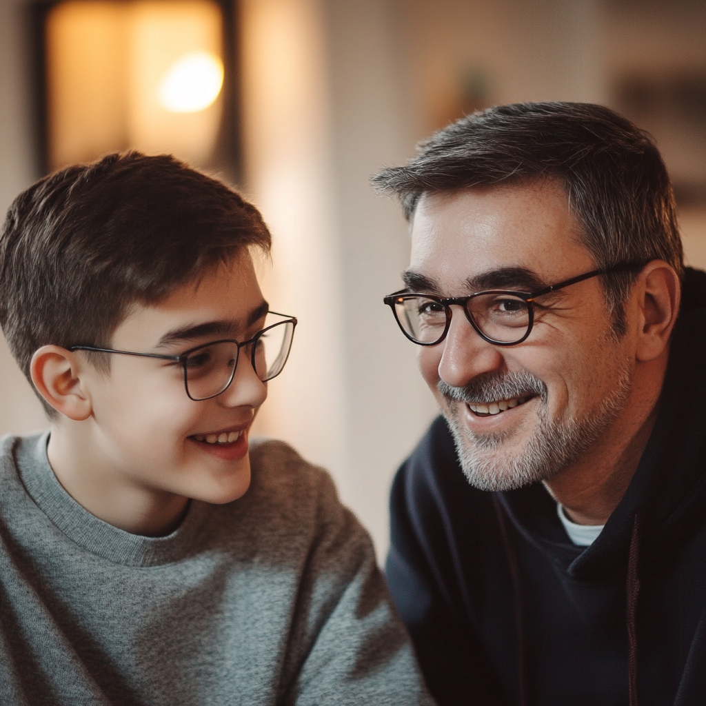 A smiling man talking to his son | Source: Midjourney