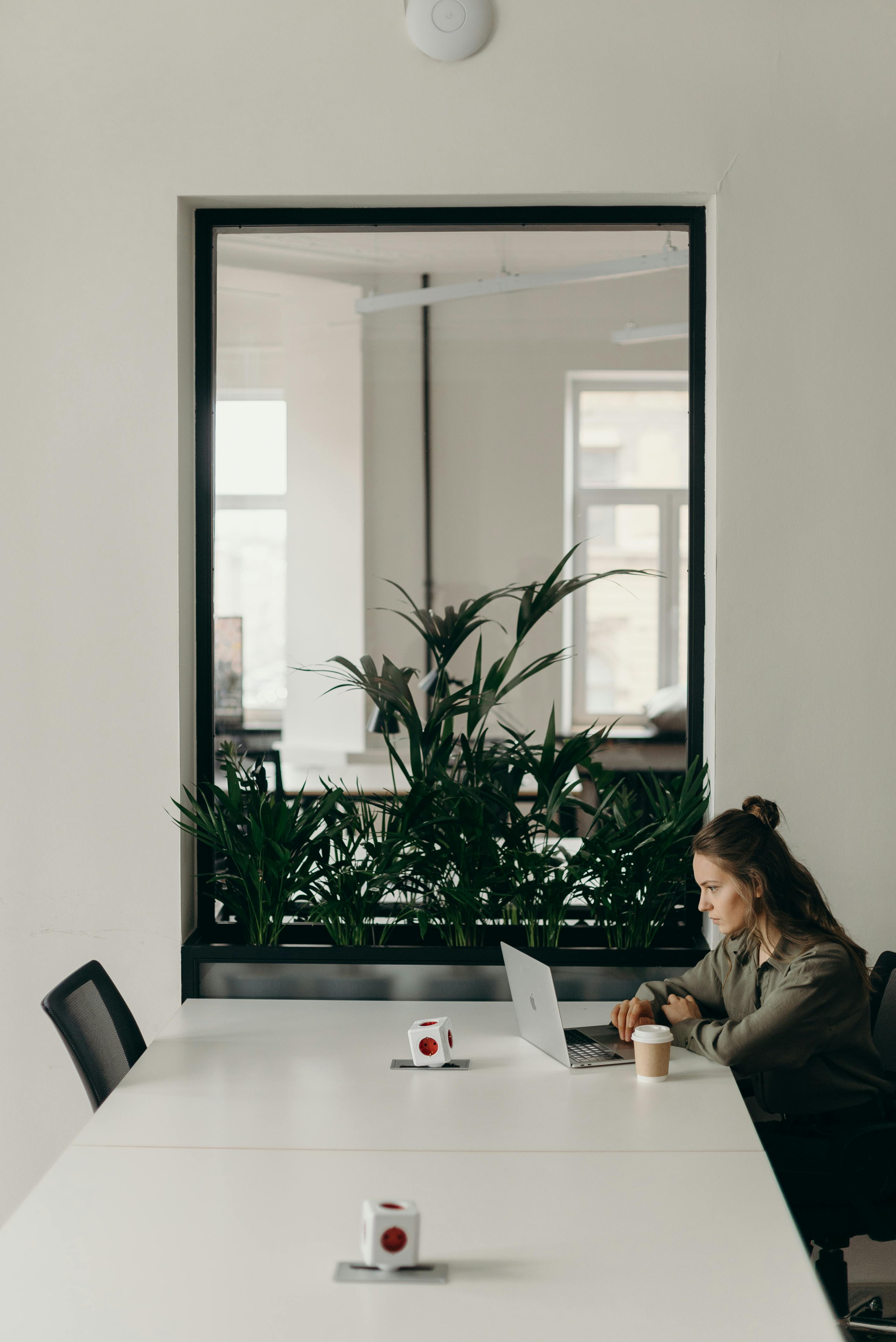 A woman starring at the laptop screen | Source: Pexels