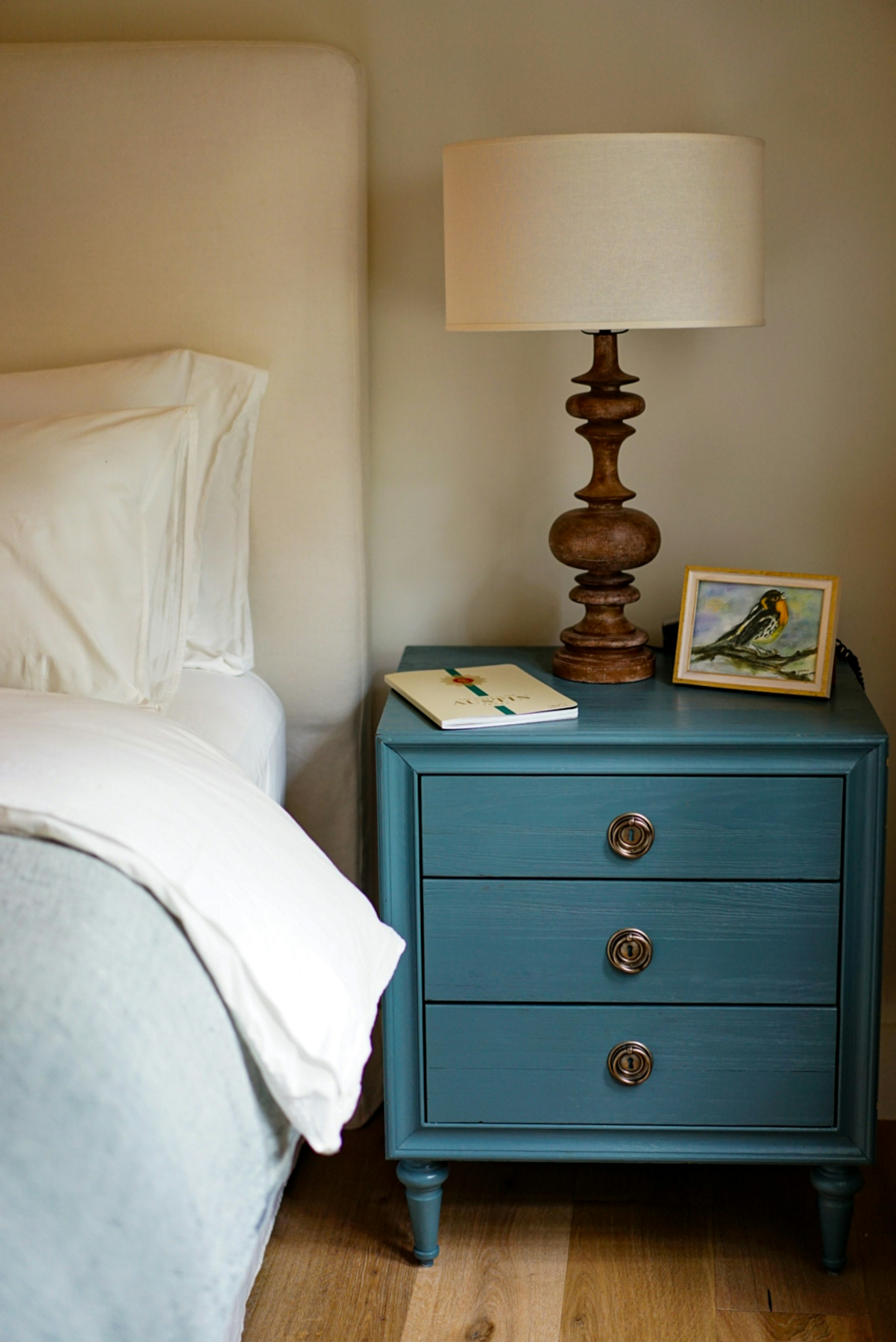 A brown wooden two-drawer nightstand | Source: Unsplash