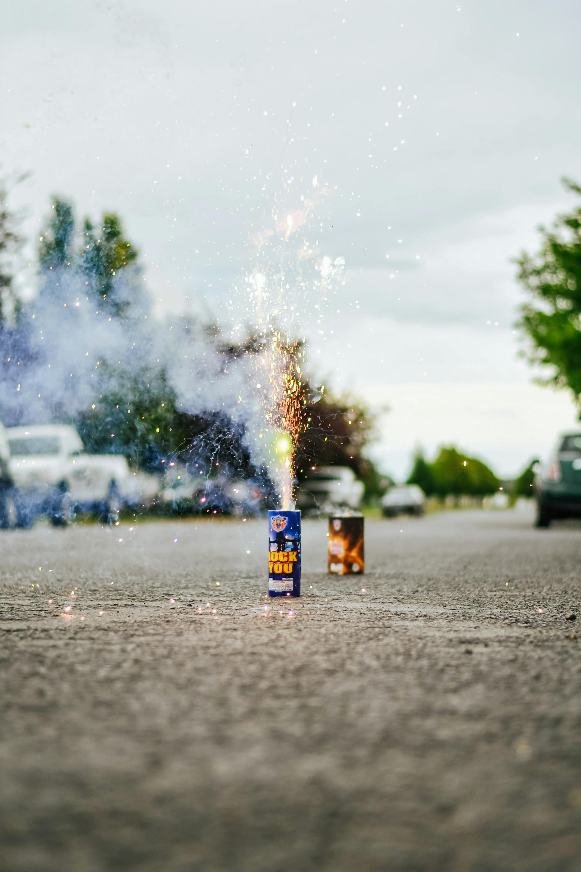 Lit fireworks on a street | Source: Pexels