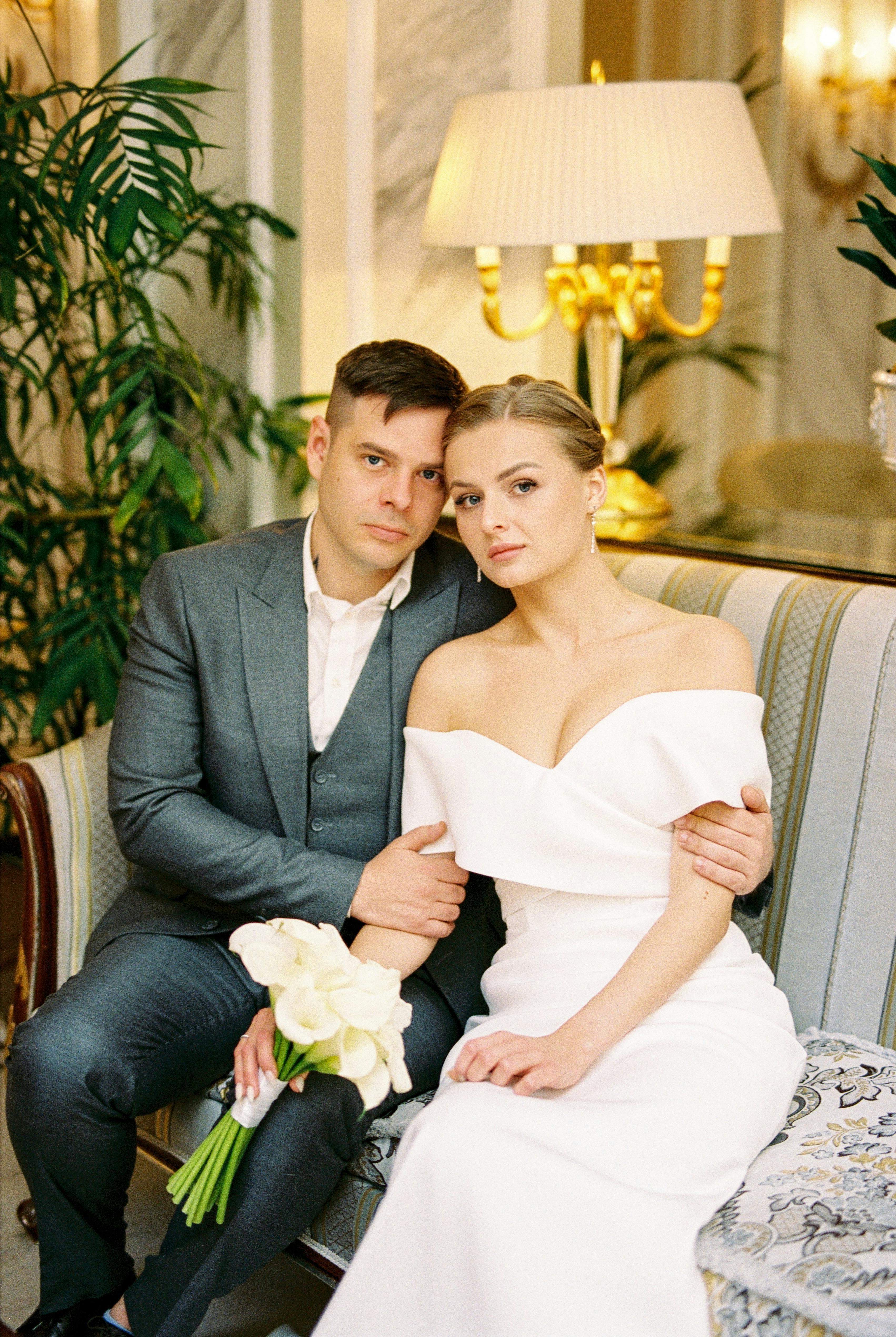 A couple posing at their wedding | Source: Pexels