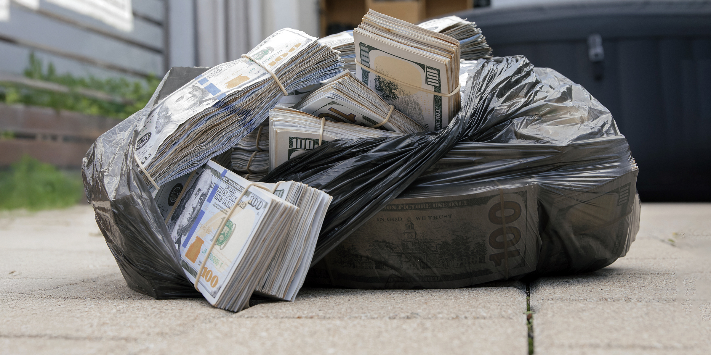 Plastic bag full of money | Source: Shutterstock