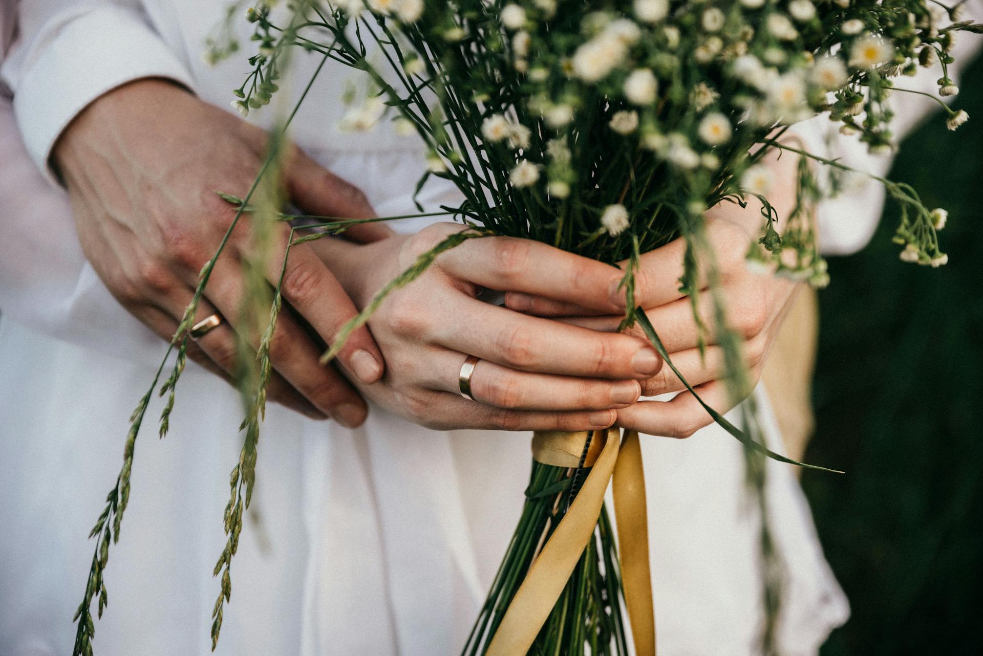 A close-up shot of a couple's hands on their wedding day | Source: Pexels