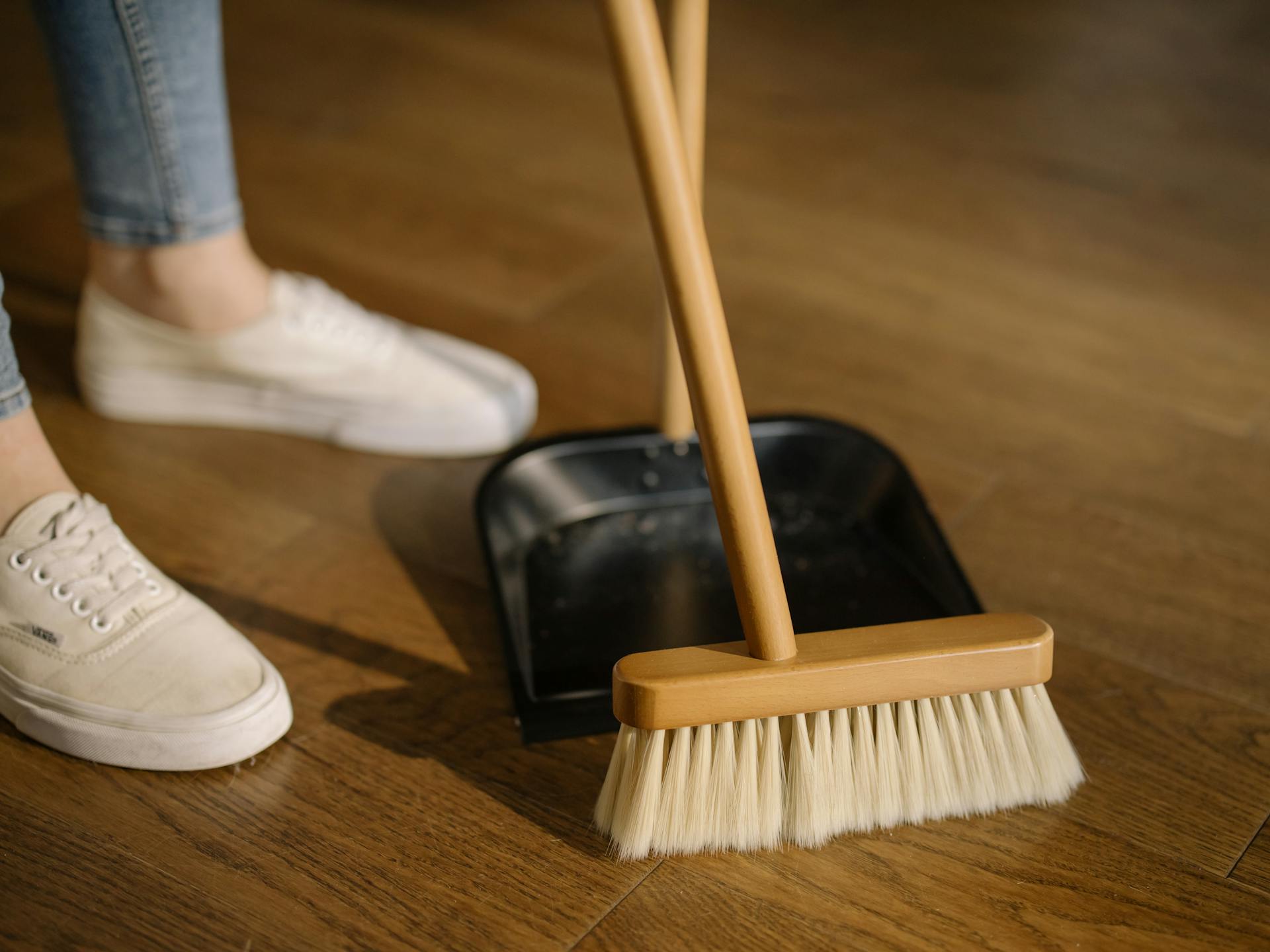 A person sweeping | Source: Pexels